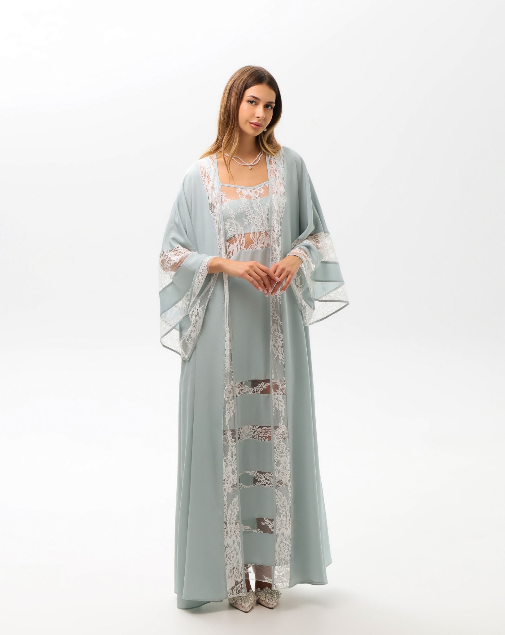 Frontal view of the layered ensemble, illustrating understated luxury and ultimate comfort for daily rituals.