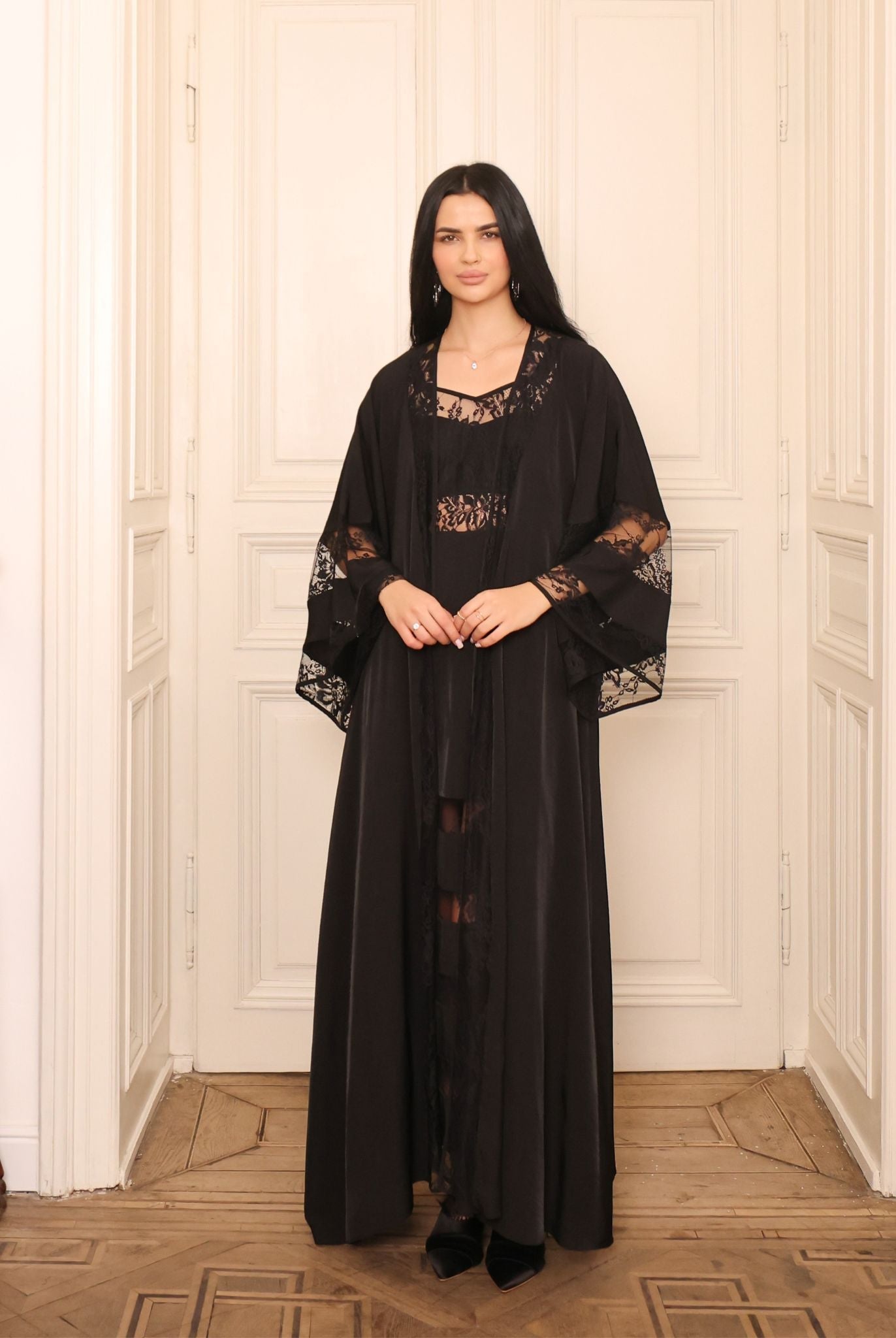 Frontal shot focusing on the robe's sleeves with lace edges, framing the feminine look beautifully.