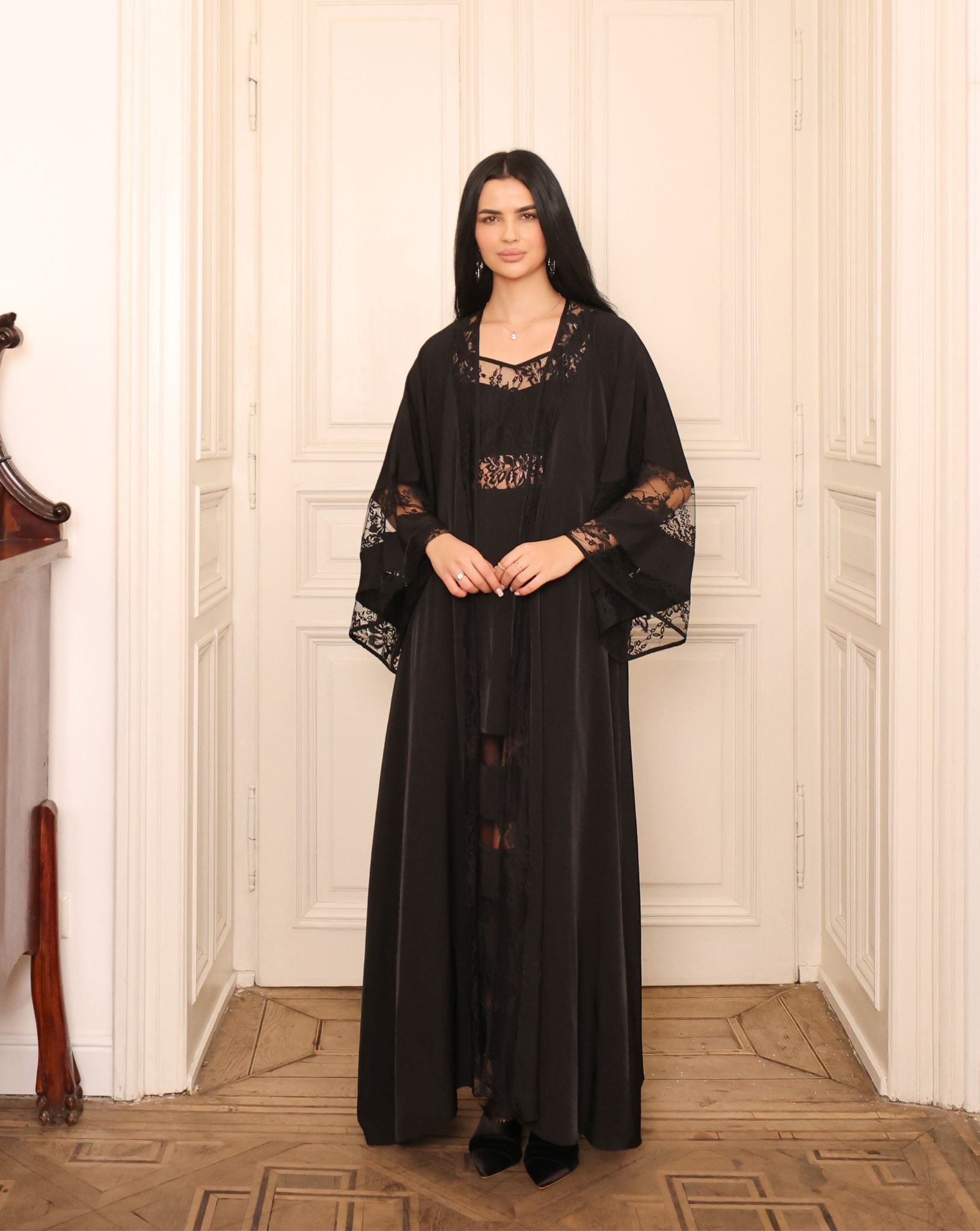 Frontal shot focusing on the robe's sleeves with lace edges, framing the feminine look beautifully.