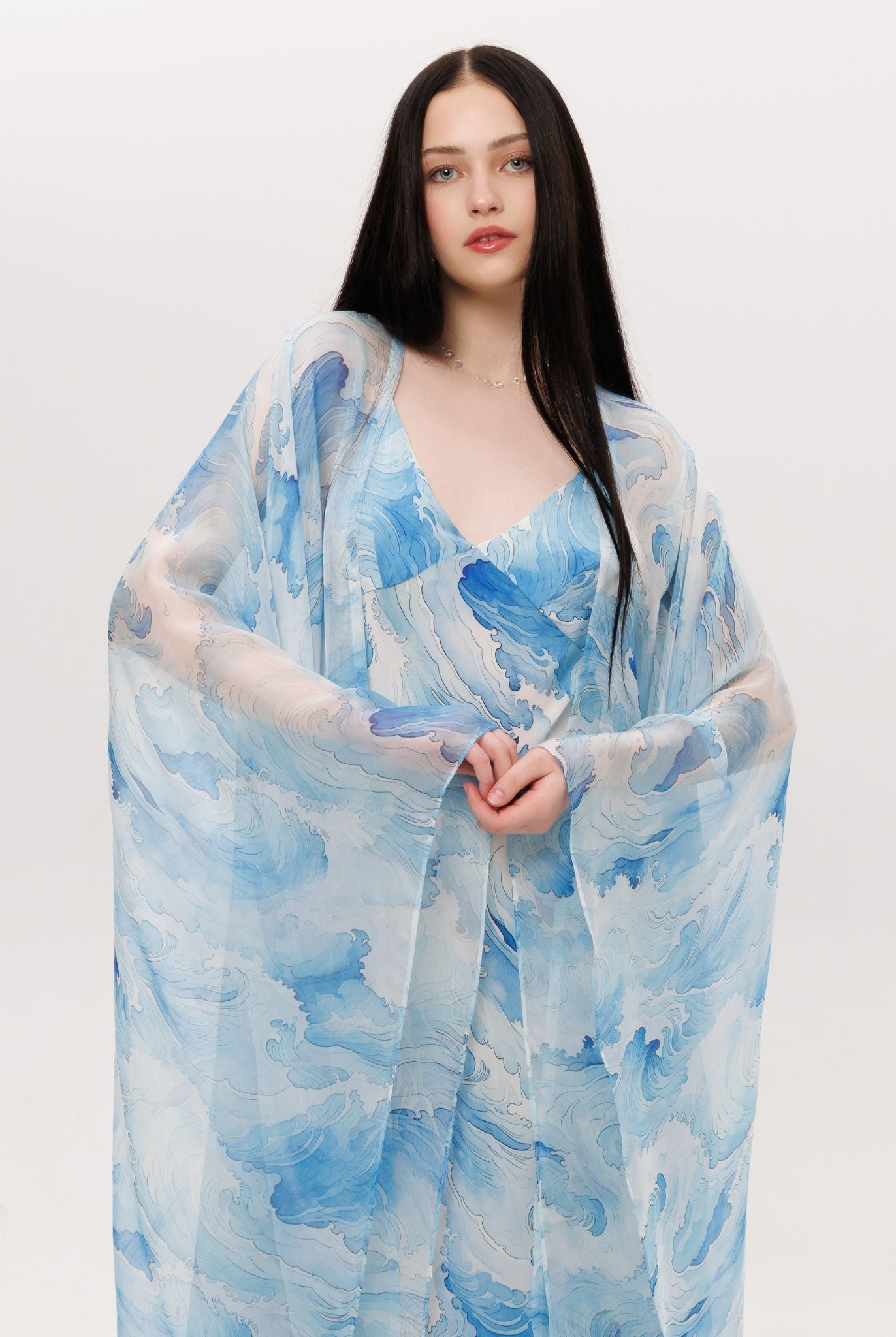 Mid-length shot of the Silk Robe and Nightgown Set, focusing on the airy silk chiffon sleeves and gentle motion.