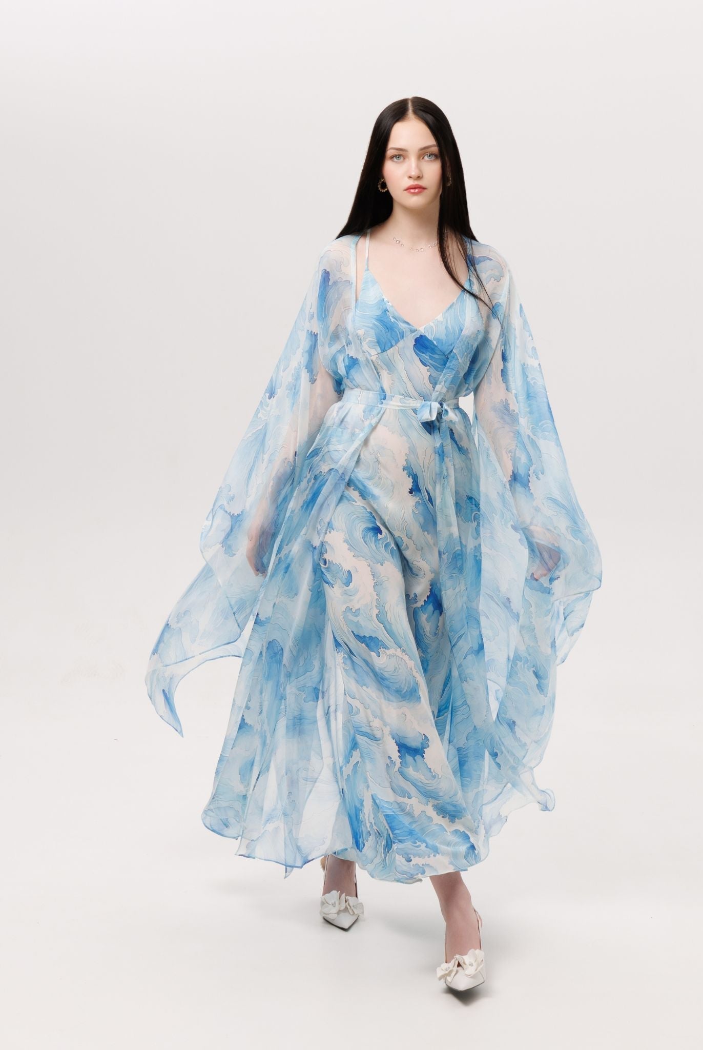 A dynamic view of the Silk Robe and Nightgown Set, illustrating the airiness of the flowing outer layer.