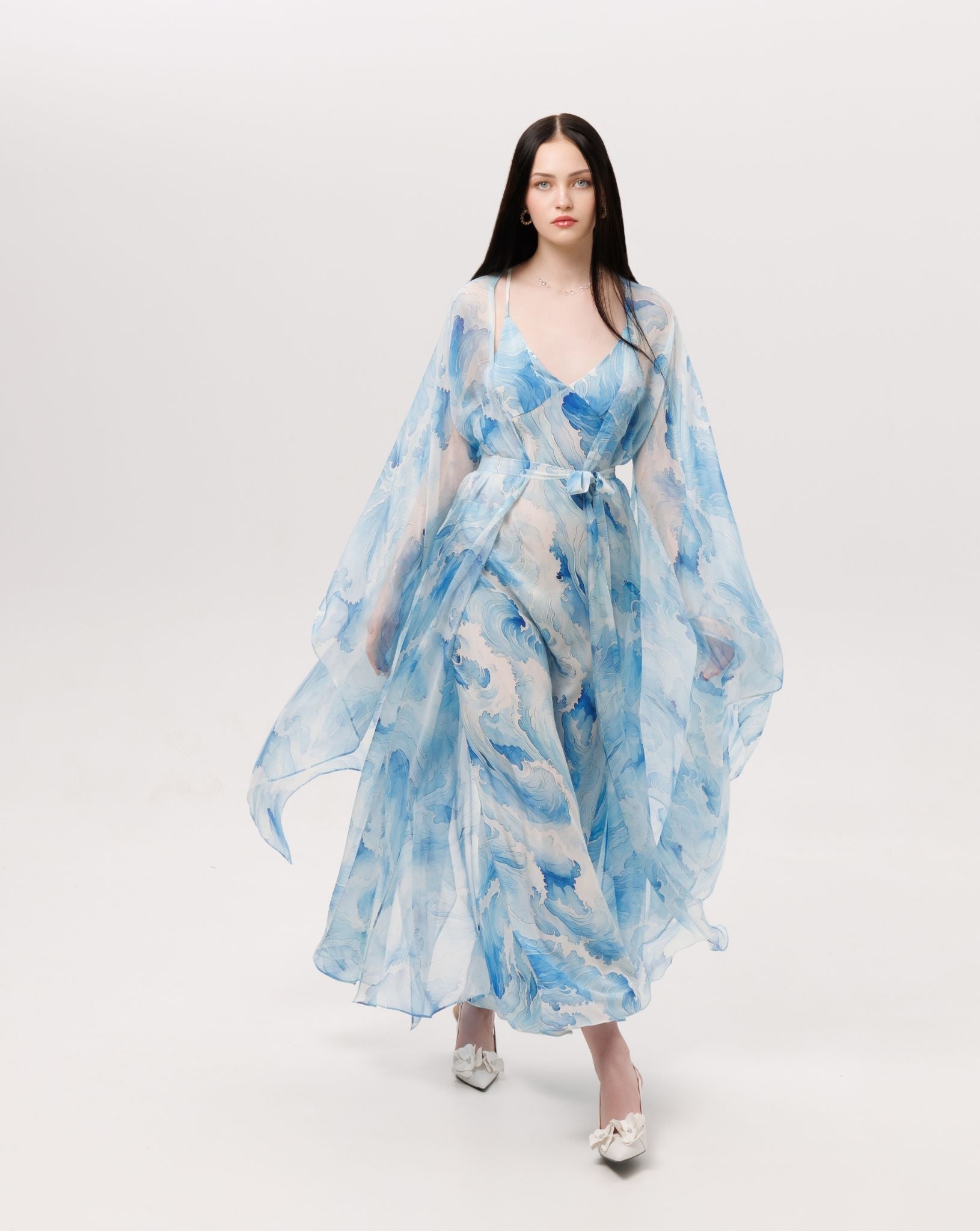 A dynamic view of the Silk Robe and Nightgown Set, illustrating the airiness of the flowing outer layer.