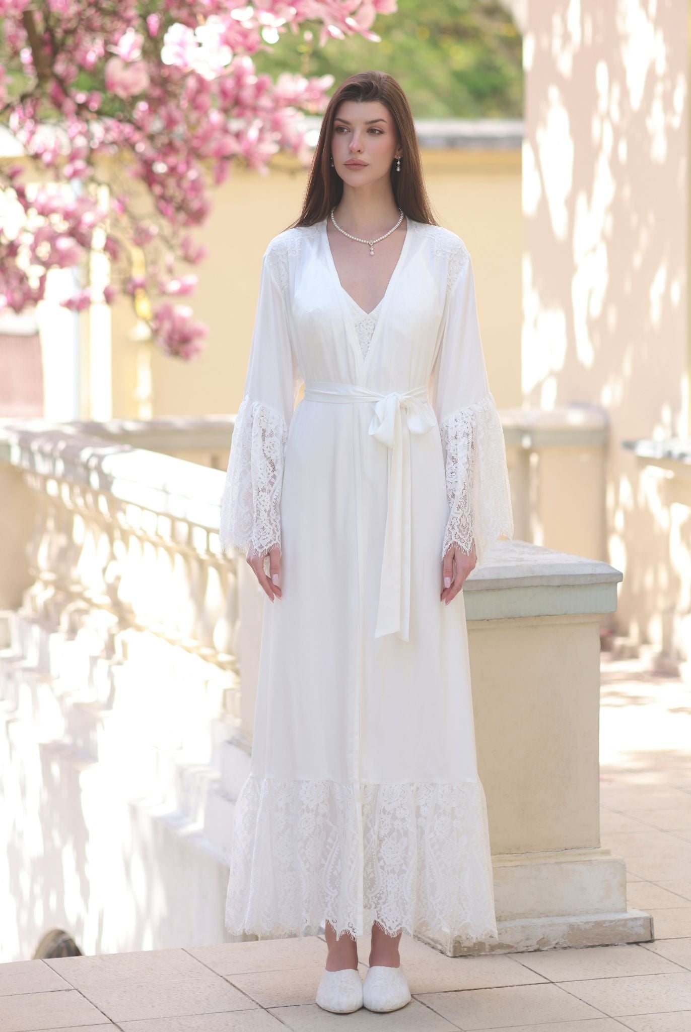 Frontal shot of the ensemble with the robe tied, illustrating the polished look and gentle coverage of the design.
