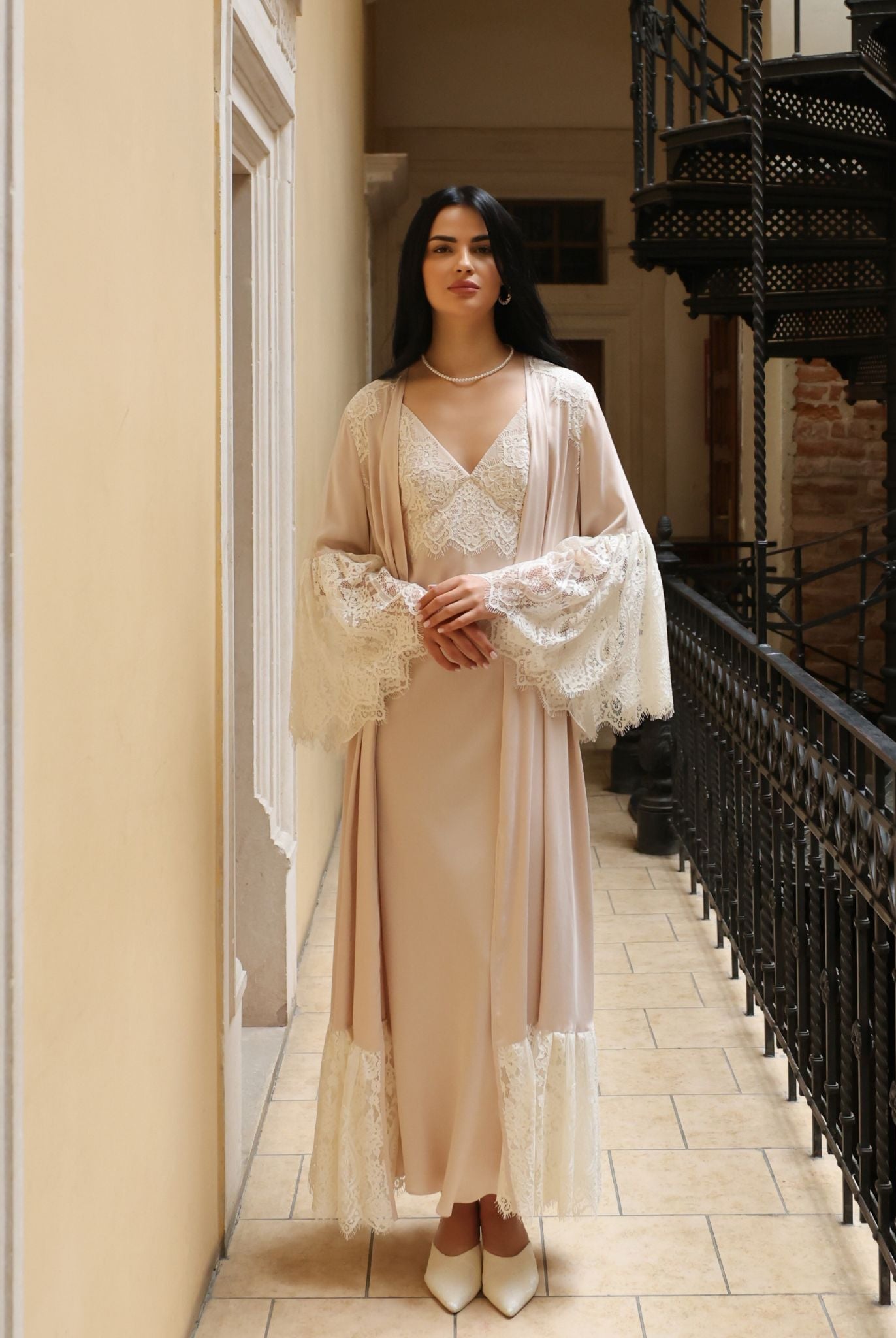 A focused shot of the Robe and Nightgown Set top, highlighting the intricate lace trim on the wide bell sleeves.