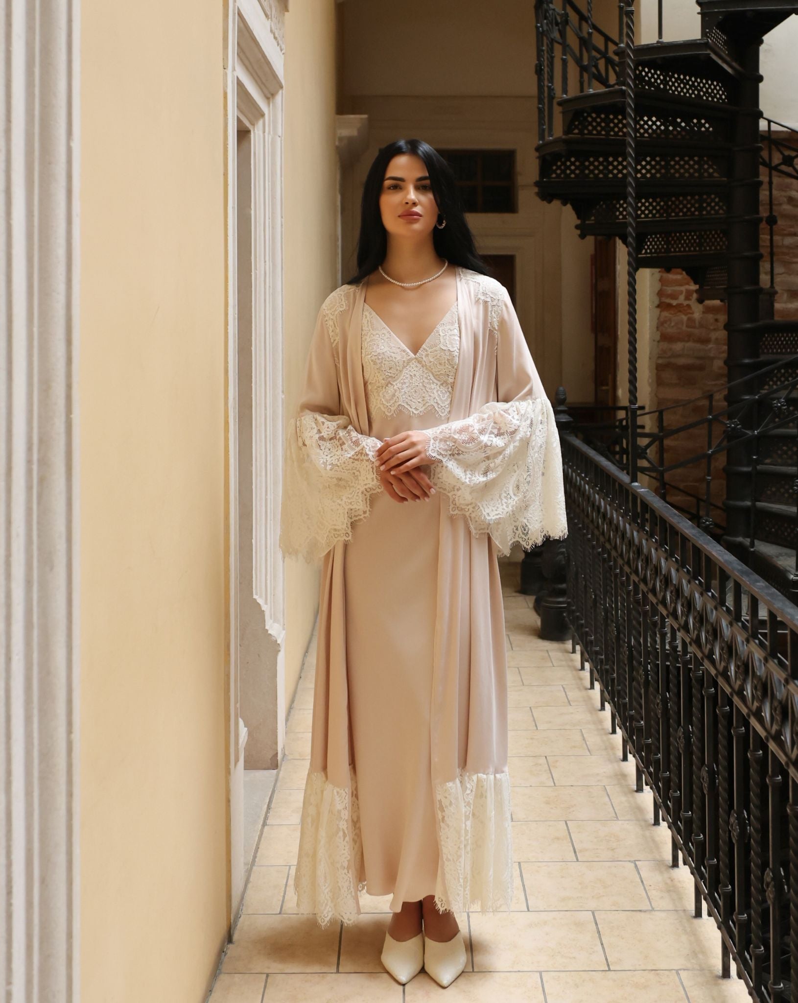 A focused shot of the Robe and Nightgown Set top, highlighting the intricate lace trim on the wide bell sleeves.