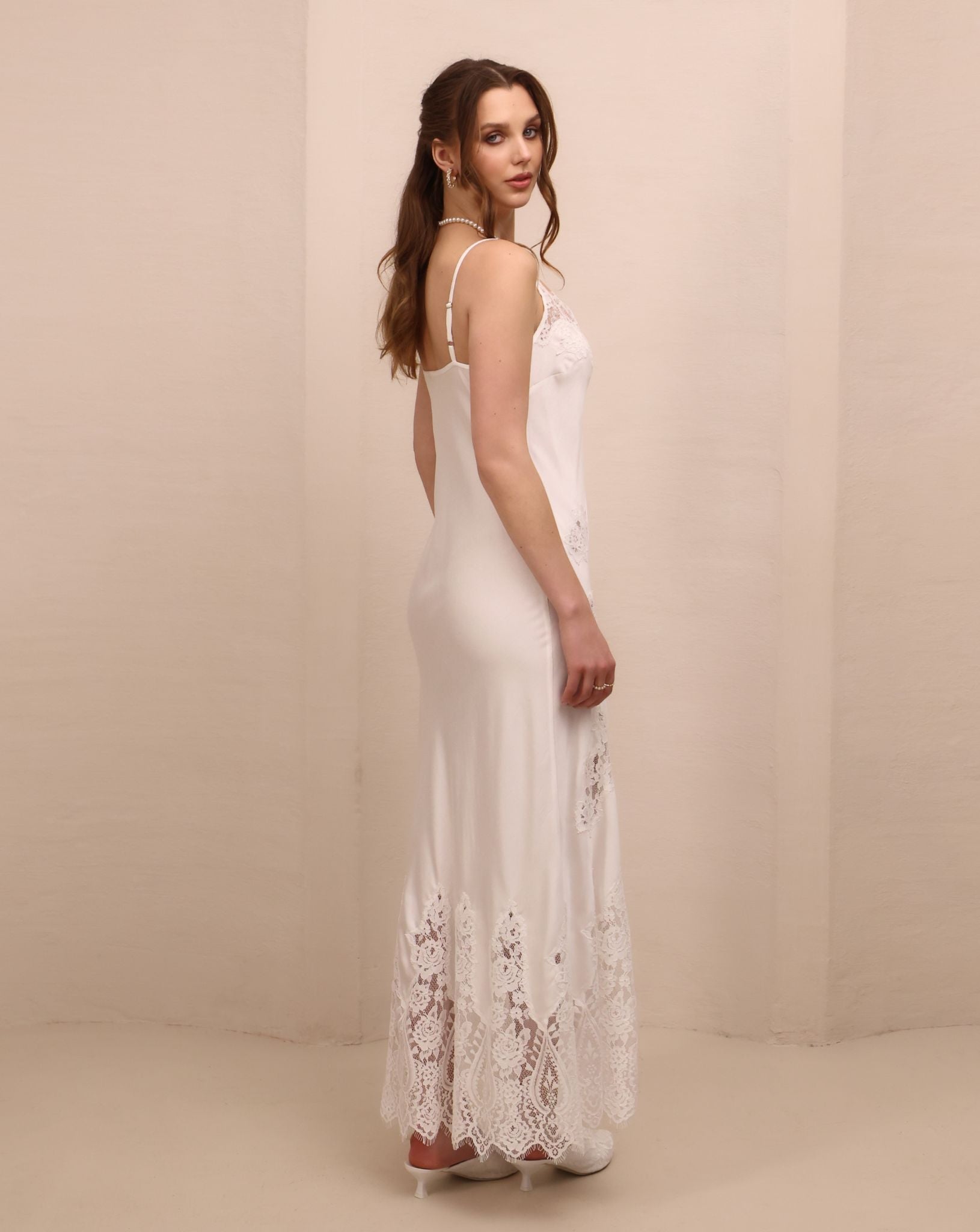 Side perspective of the nightdress, highlighting the effortless elegance and the soft touch against the skin.