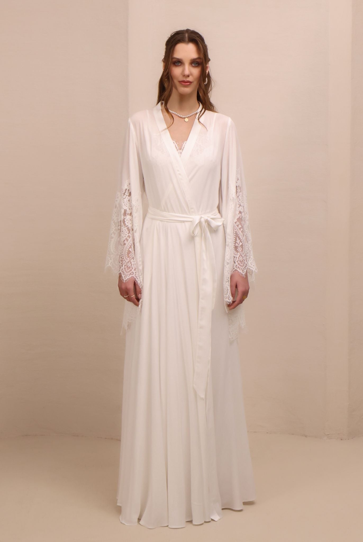 A final static view of the tied ensemble, illustrating the balance of romance and comfort for the home wardrobe.