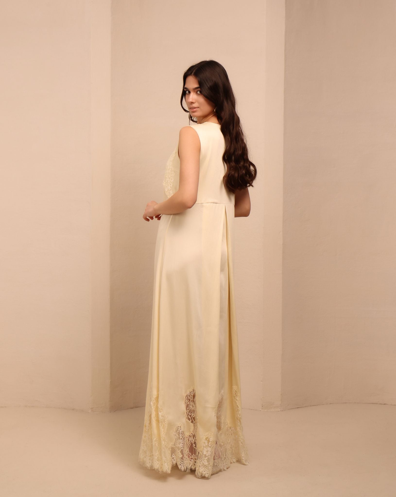 Side perspective of the maternity nightgown, showcasing its simple silhouette and the natural softness of rayon.