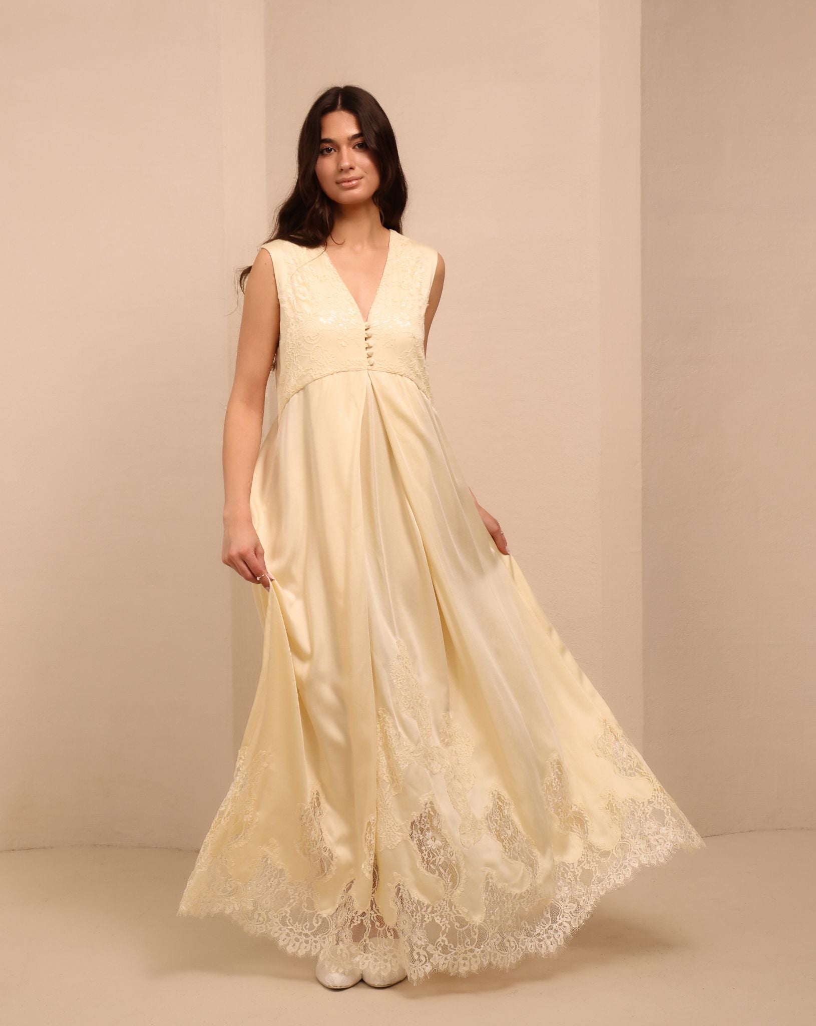 A motion shot of the nightdress in a vanilla shade, highlighting the light rayon fabric that breathes with every step.