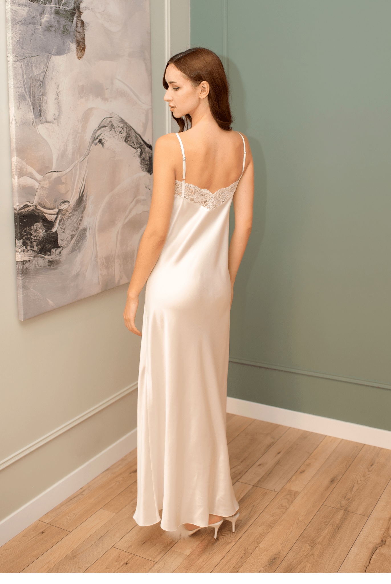 Rear view of the floor-length nightgown, showcasing the elegant silhouette and the premium quality of the materials.