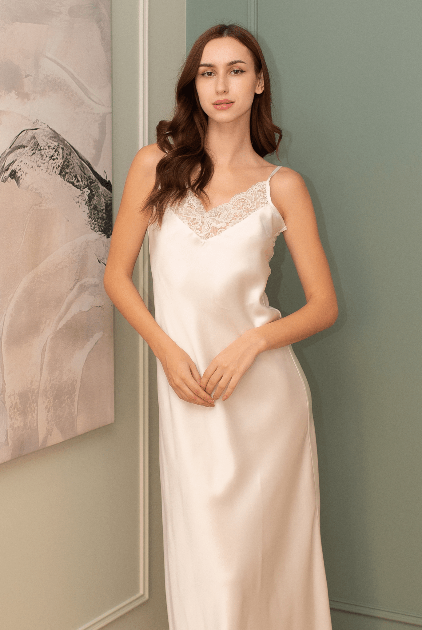 Mid-length view of the pure silk nightdress, focusing on the wider fit and the cool, calming surface of the fabric.