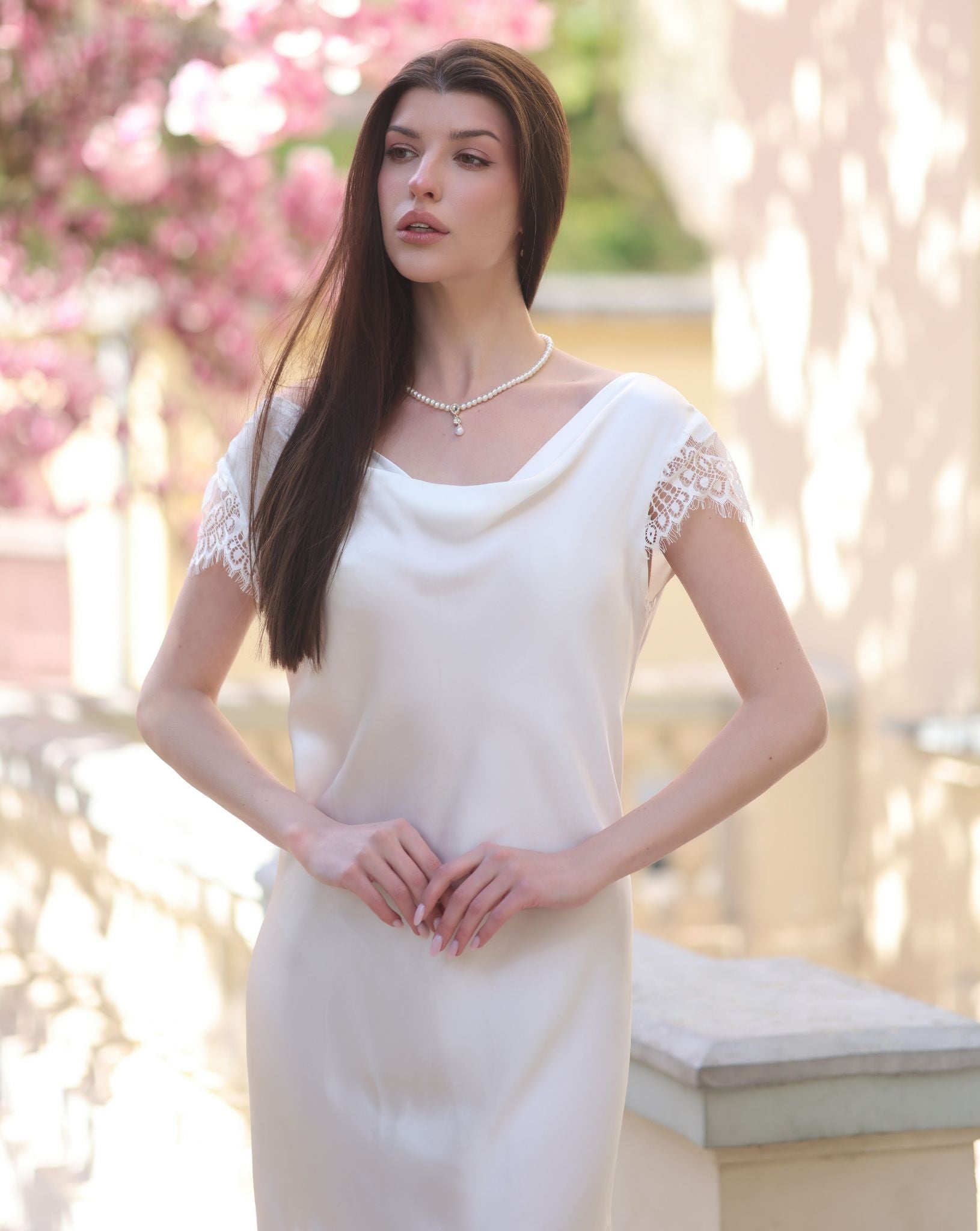 Mid-length shot of the silk nightgown, highlighting the flattering fit and refined feminine drape.