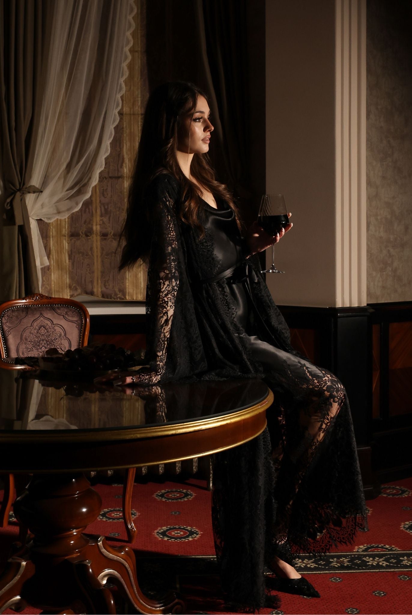 A creative pose highlighting the timeless appeal of the silk and lace combination for an unforgettable evening.