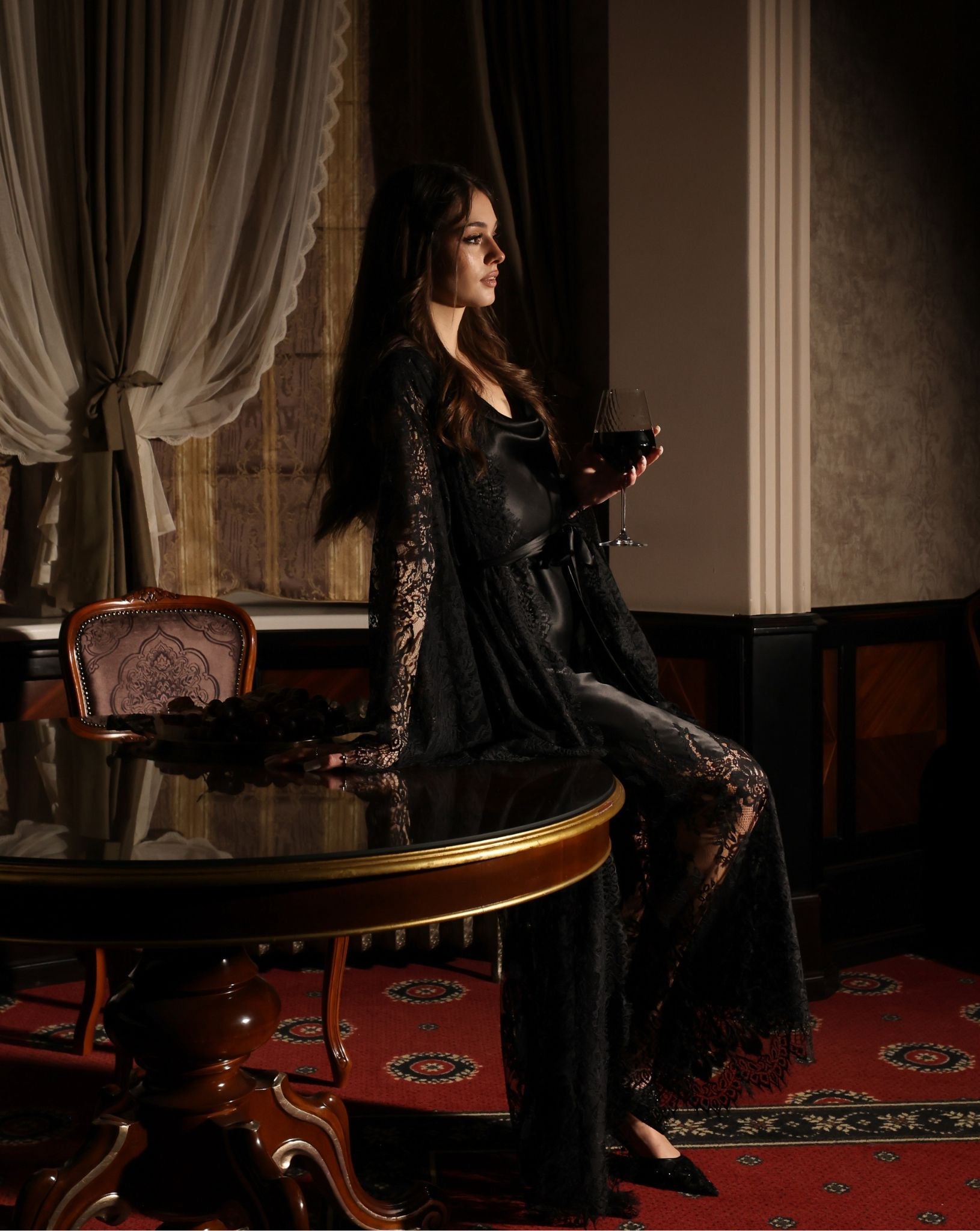A creative pose highlighting the timeless appeal of the silk and lace combination for an unforgettable evening.