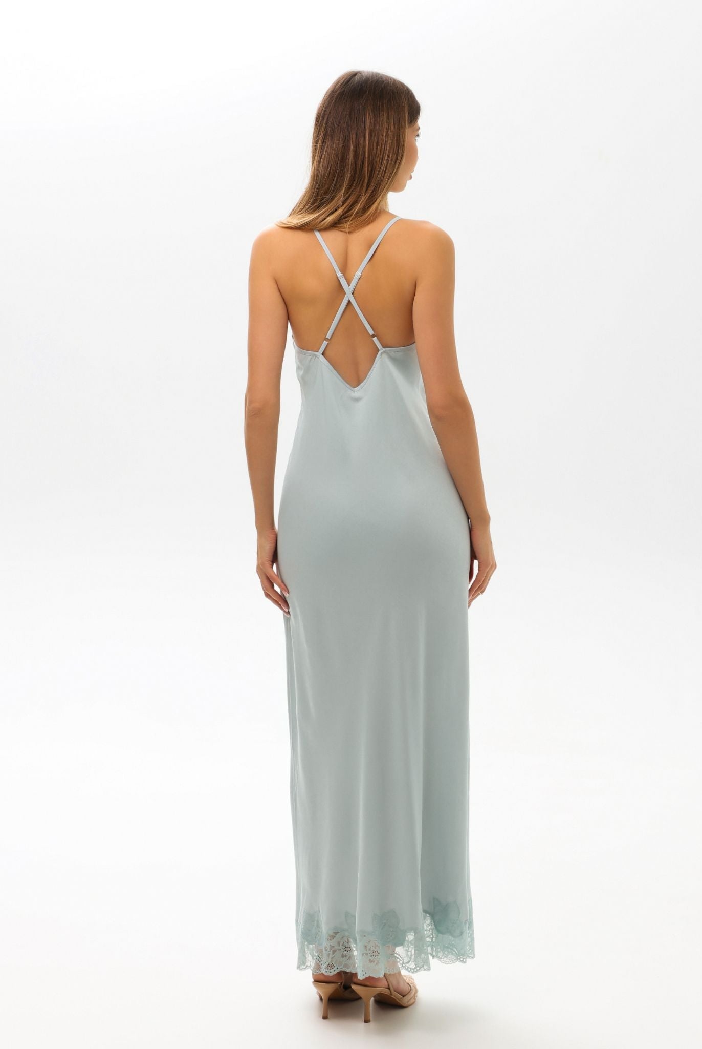 Rear perspective of the nightdress, featuring a strappy back with length regulation for a perfect, flattering fit.