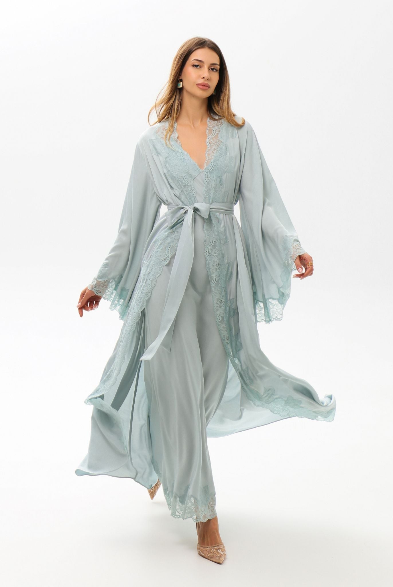 A full-length motion shot of the Robe and Nightgown Set, capturing the breathable and fluid drape of 100% viscose.