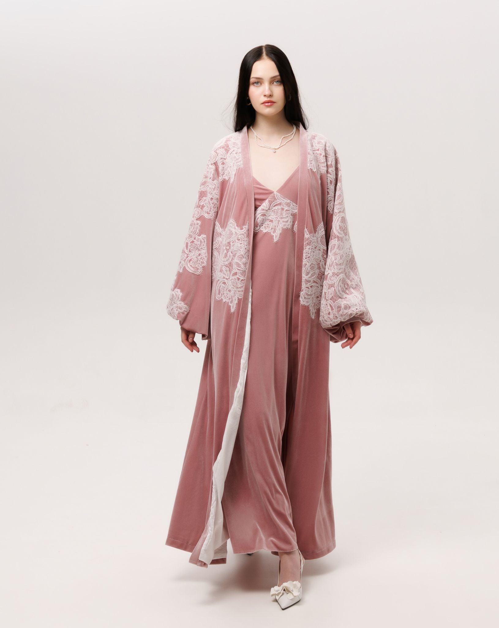 Capturing the Velvet Robe and Nightgown Set in motion, as the voluminous fabric follows every movement.