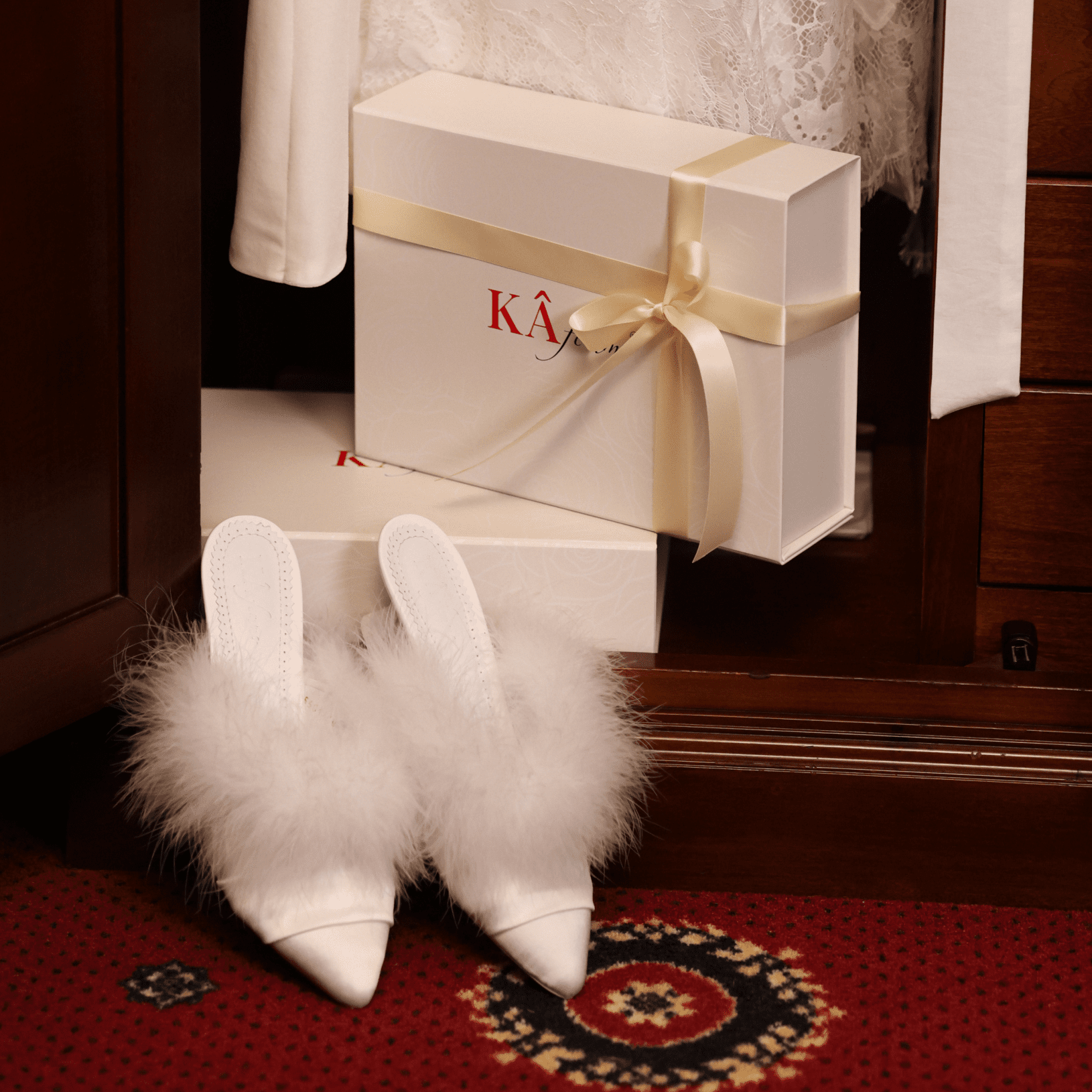 Creative shot of the elegant footwear near branded boxes, capturing a whisper of glamour for the modern muse.