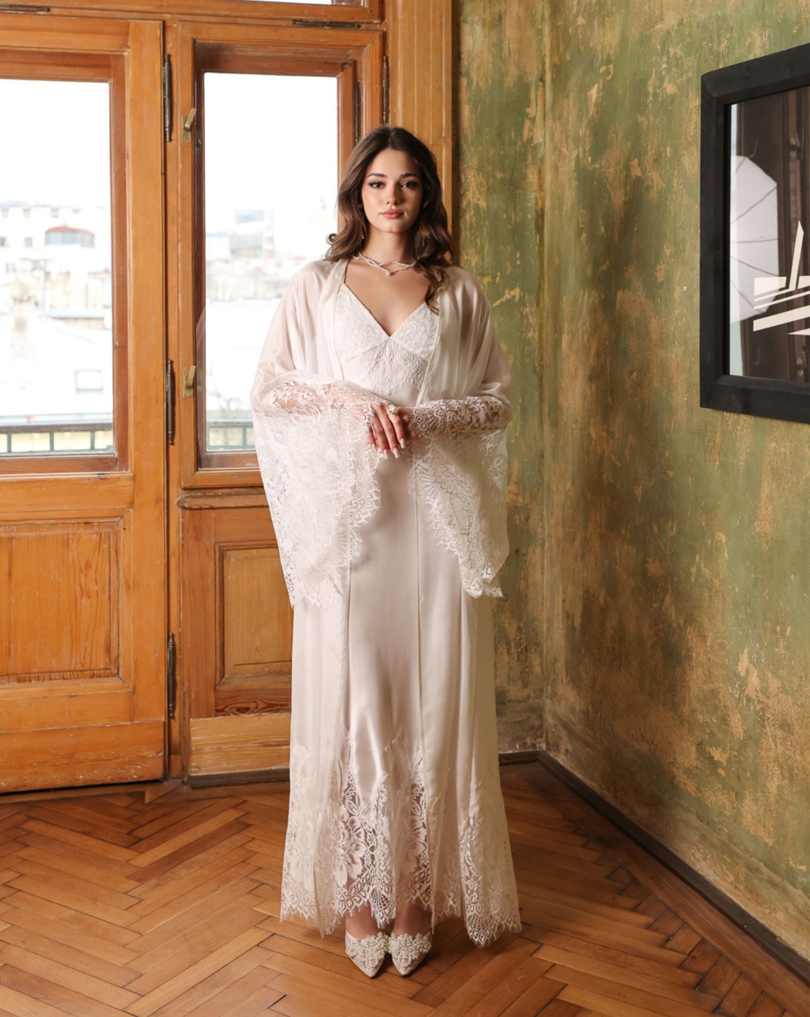 Luxurious Silk Robe and Nightgown Set featuring wide airy sleeves adorned with intricate floral lace patterns.