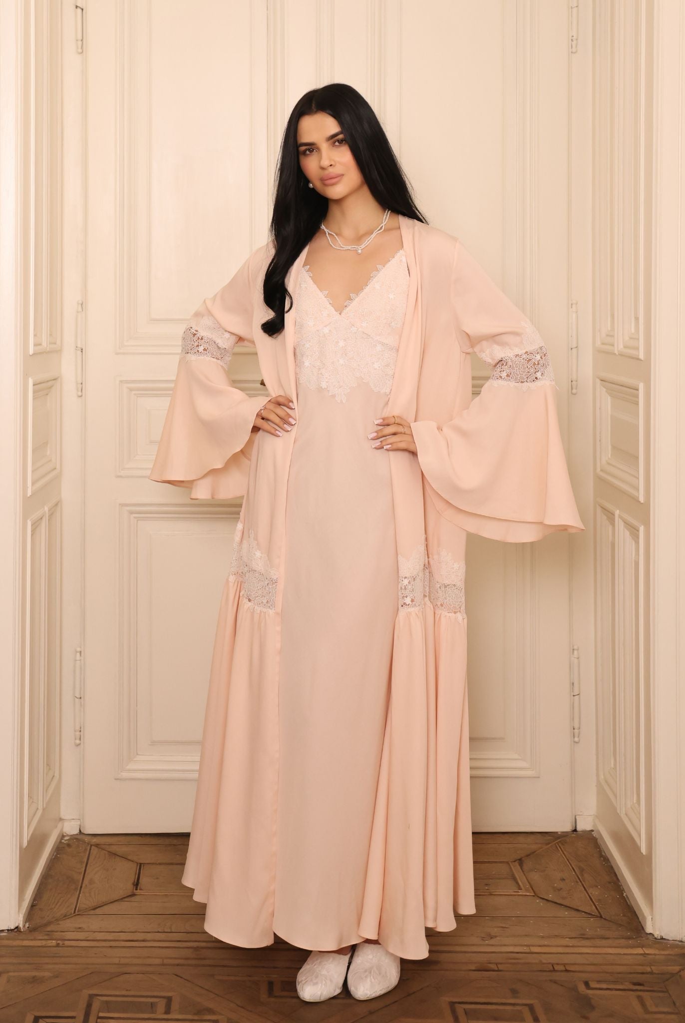 A full-height view of the Cotton Robe, emphasizing the softly flared sleeves and the feminine volume.