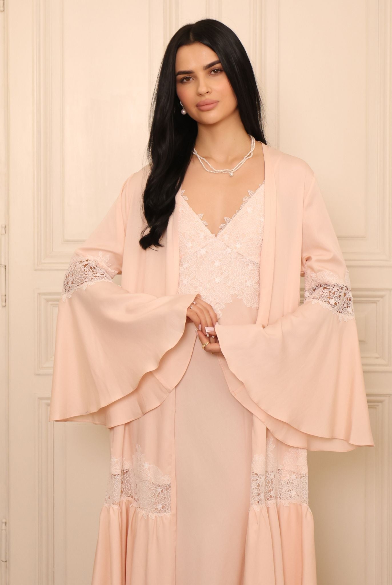 Mid-length shot showing the sleeve details and the light, reassuring feel of the material against the skin.