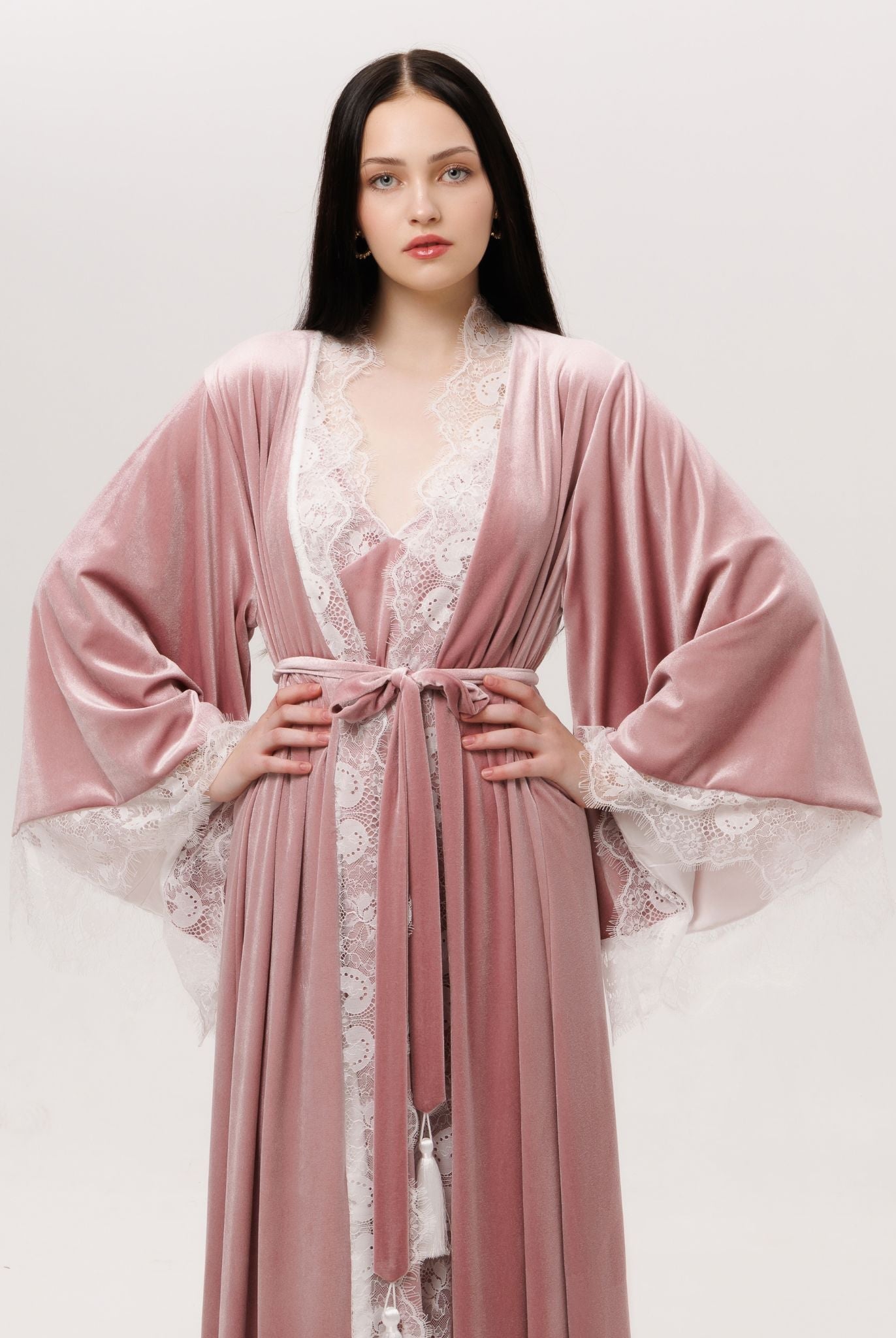 A mid-length view with hands on the waist, showcasing the luxurious essential for quiet, sensual moments.