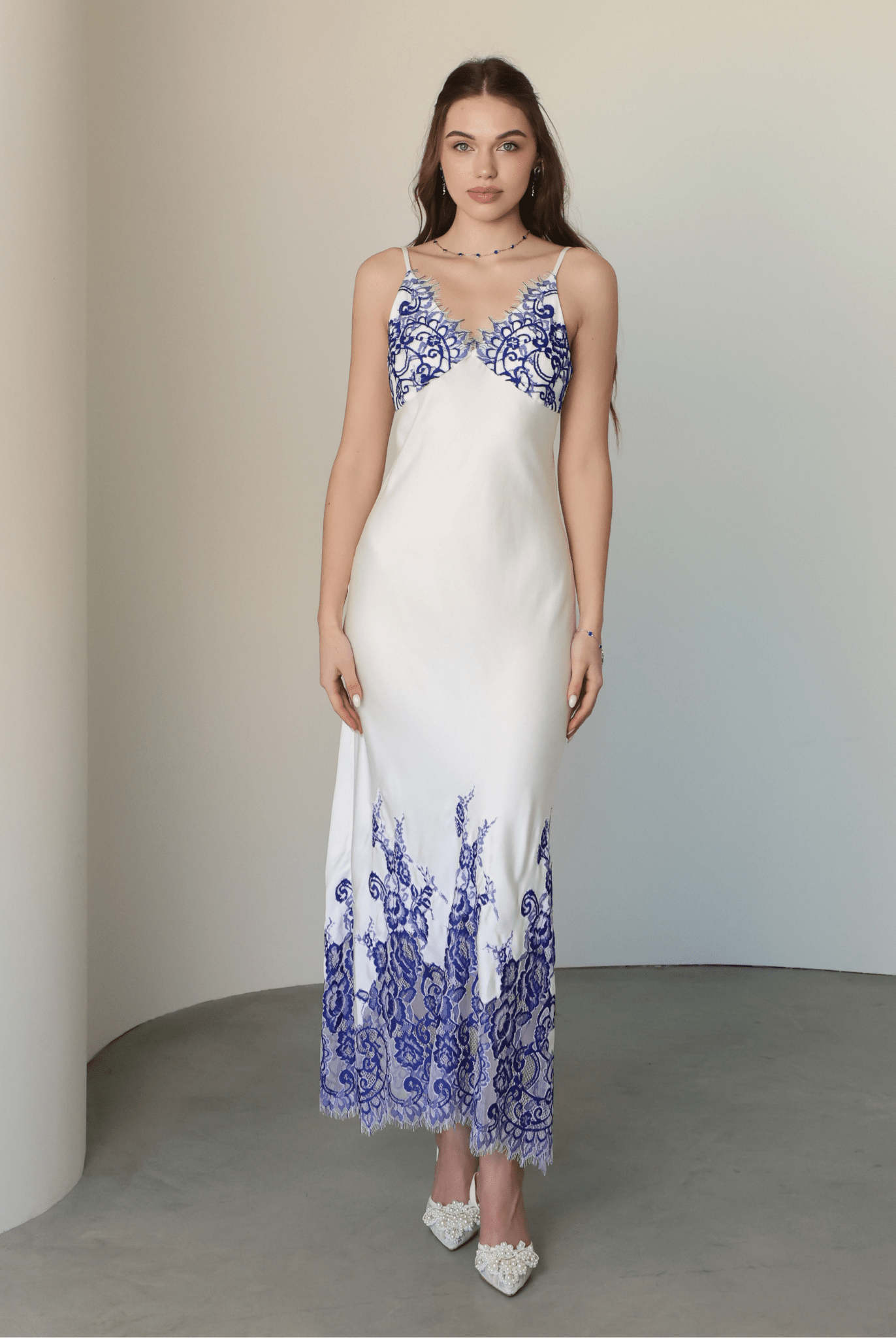 Frontal view of the nightdress with lace detailing at the neckline and a comfortable, non-padded design.