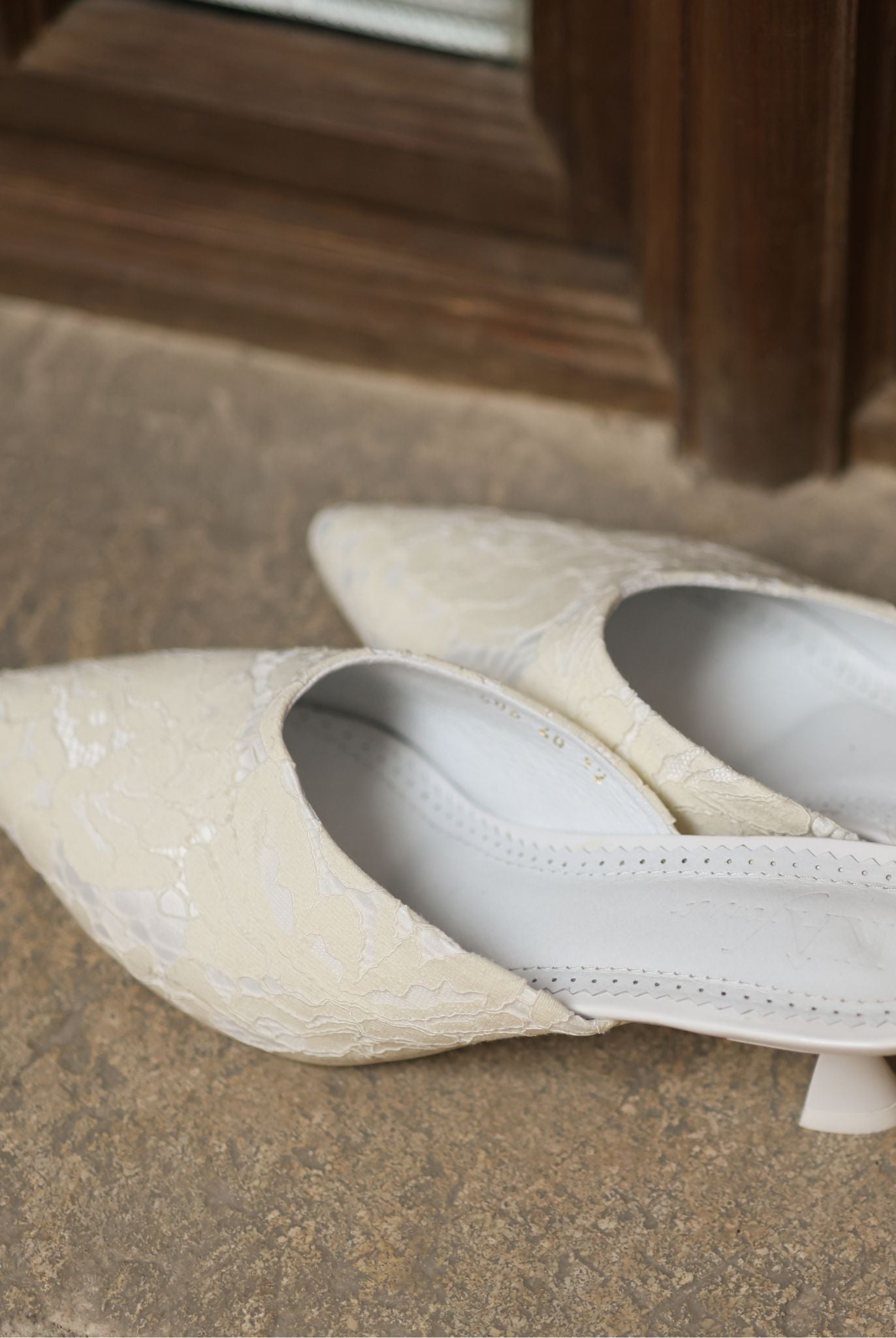 A static top view of the Satin Slippers, showcasing the soft padded insole made of genuine leather.