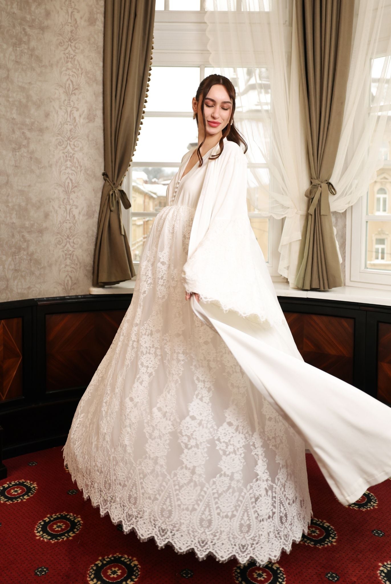 A dynamic, "flying" shot of the Velvet Robe and Nightgown Set, celebrating its visual poetry and lightness.