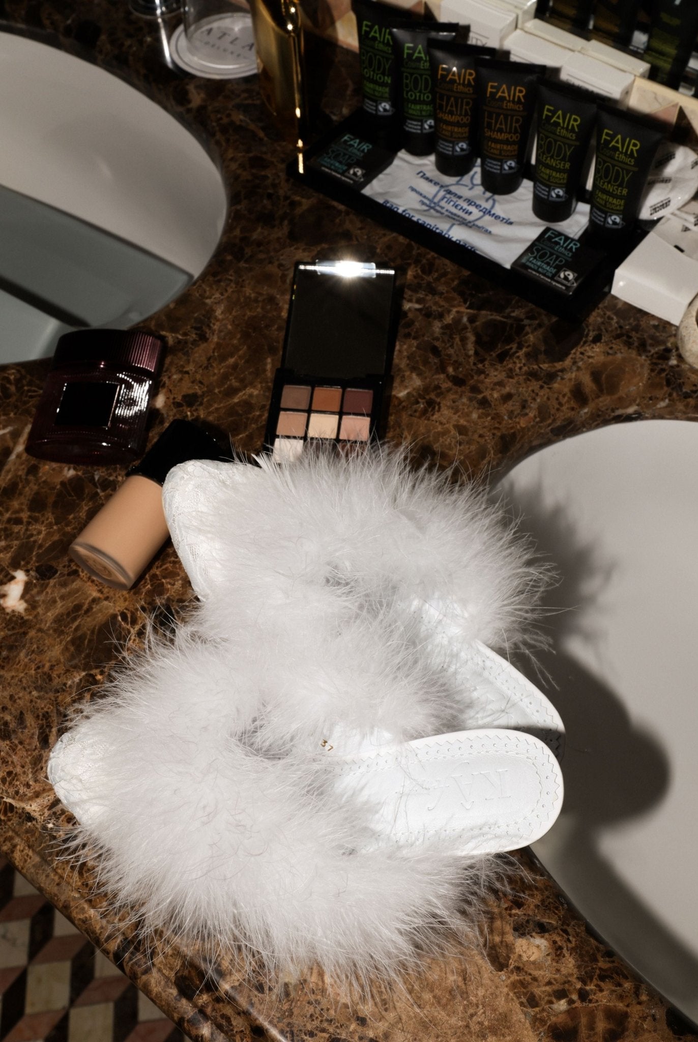 A creative shot of the Heeled Slippers featuring a 4 cm heel, bringing a glamorous touch to the home routine.