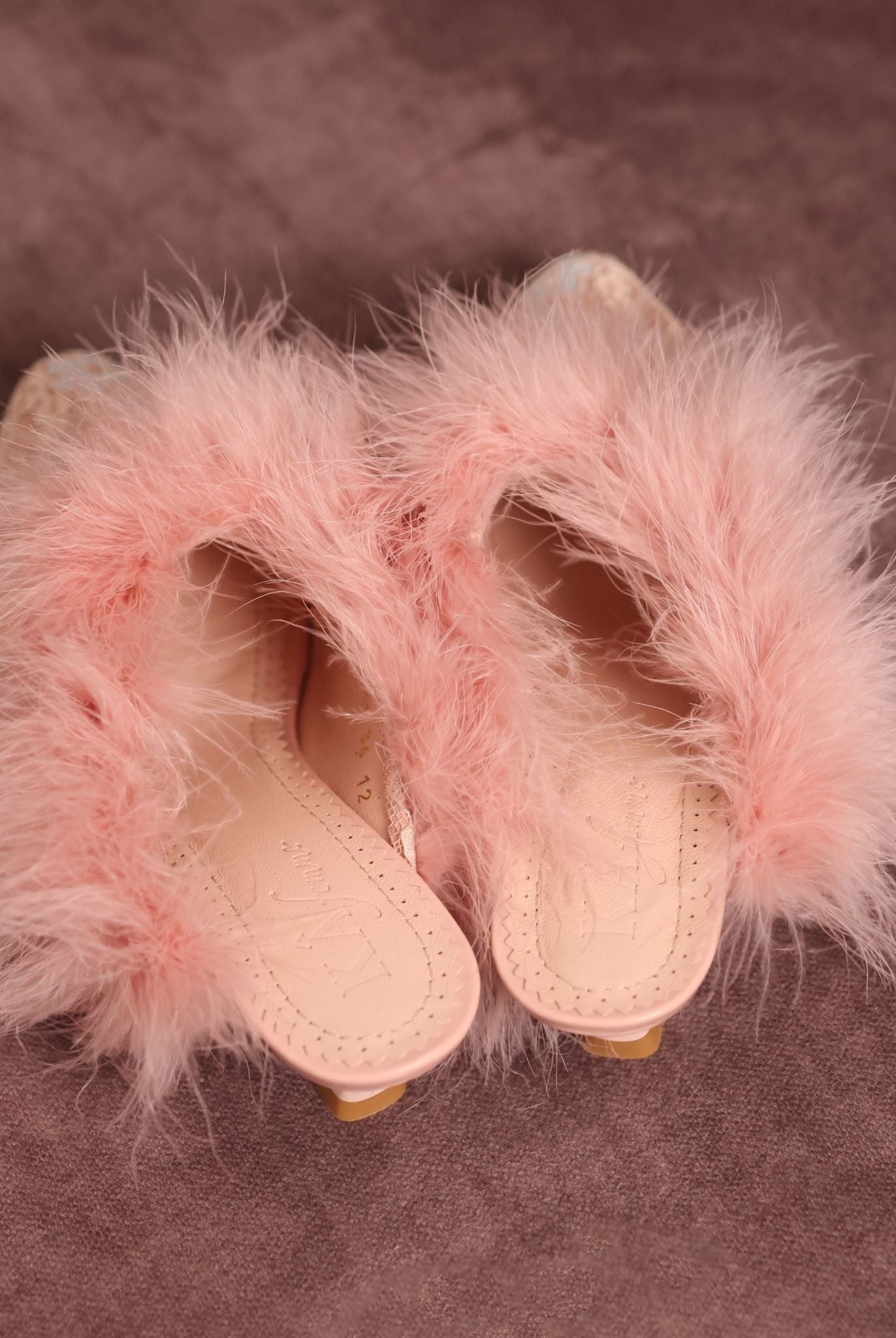 High-angle view of the pair alone, showcasing the genuine leather insole with soft padding for effortless wear.