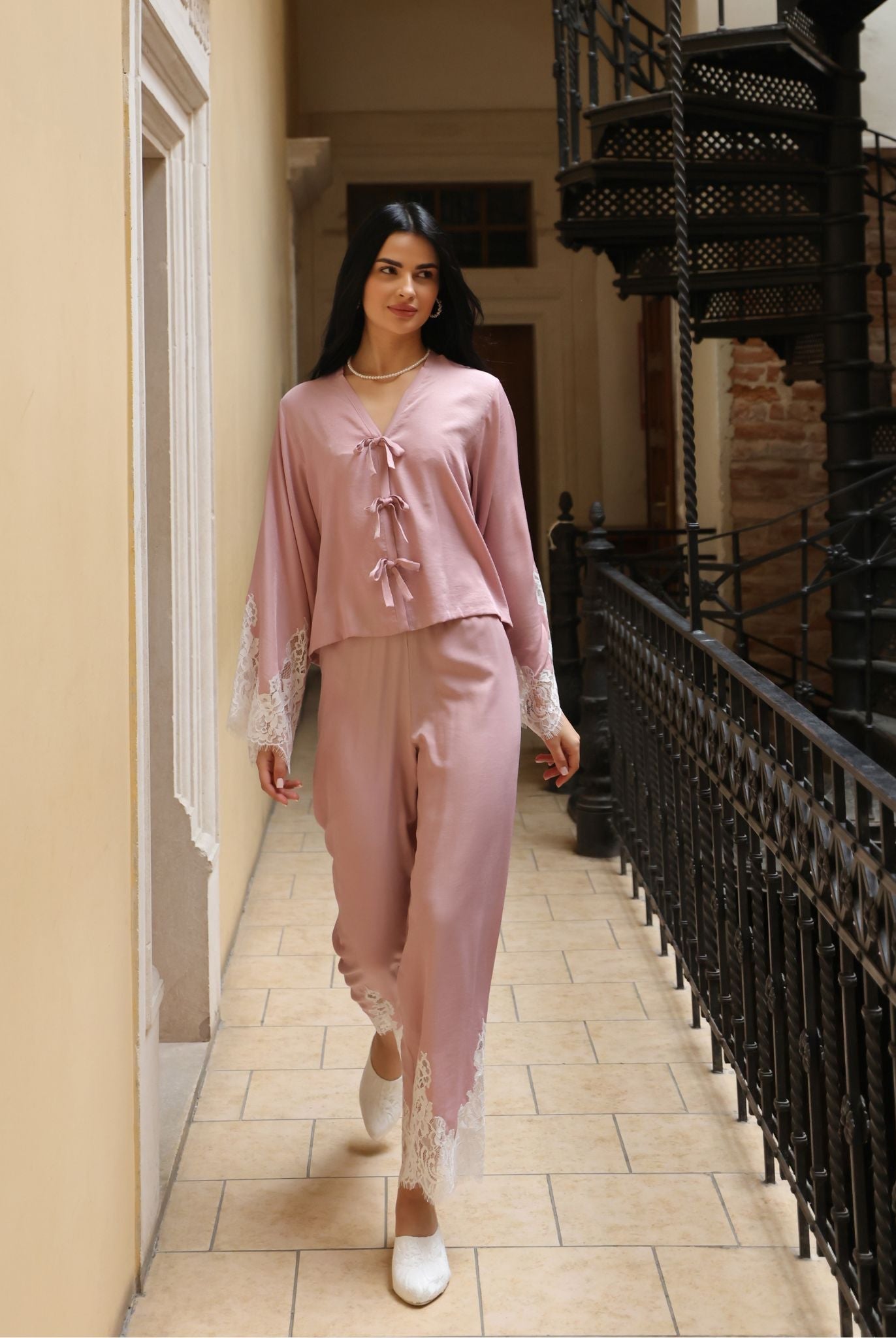 A full-length motion shot of the attire, illustrating the effortless fall of the pants and breathable comfort.