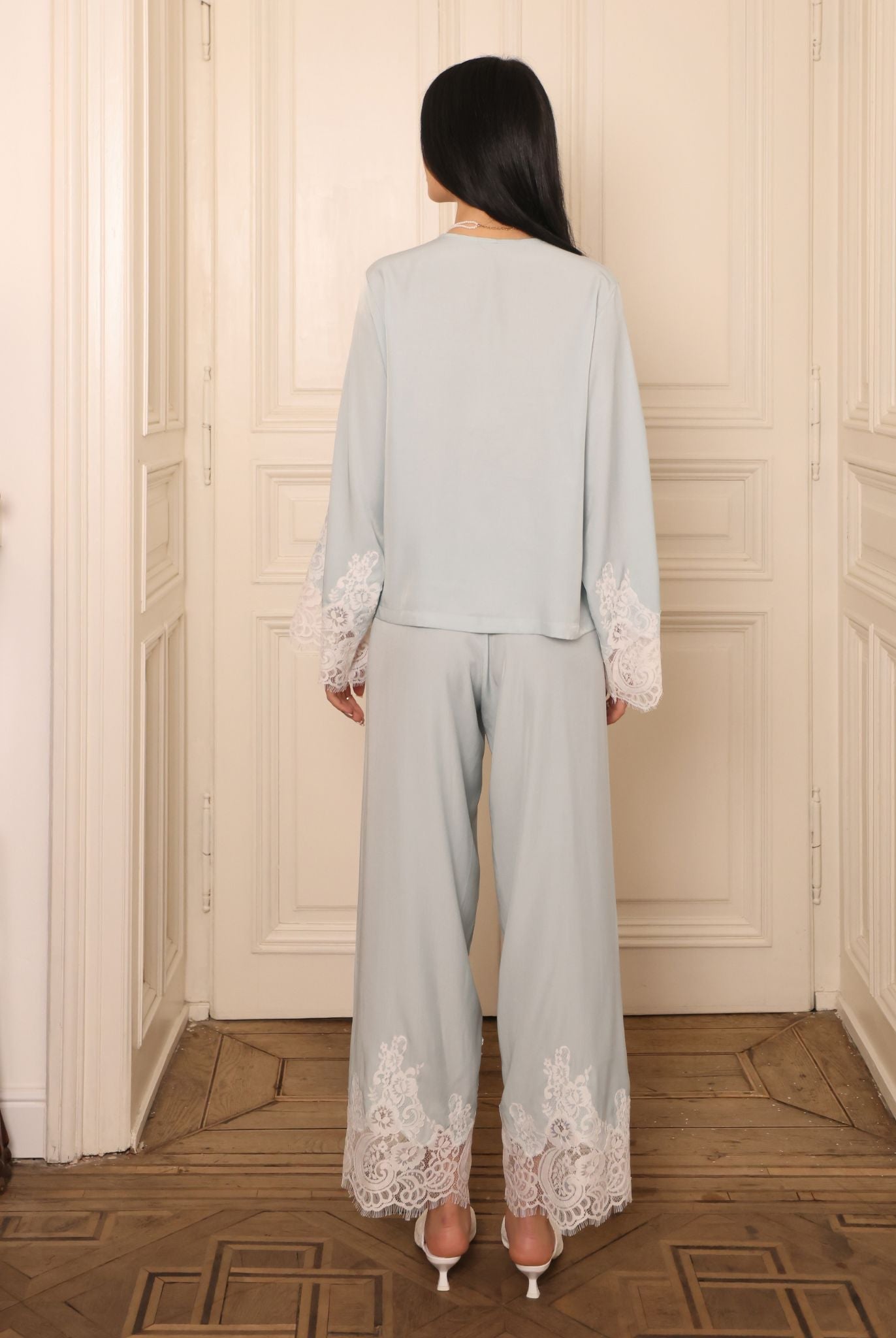 Rear perspective of the pajama set, illustrating the smooth feel of the fabric and the effortless, flowing fit.