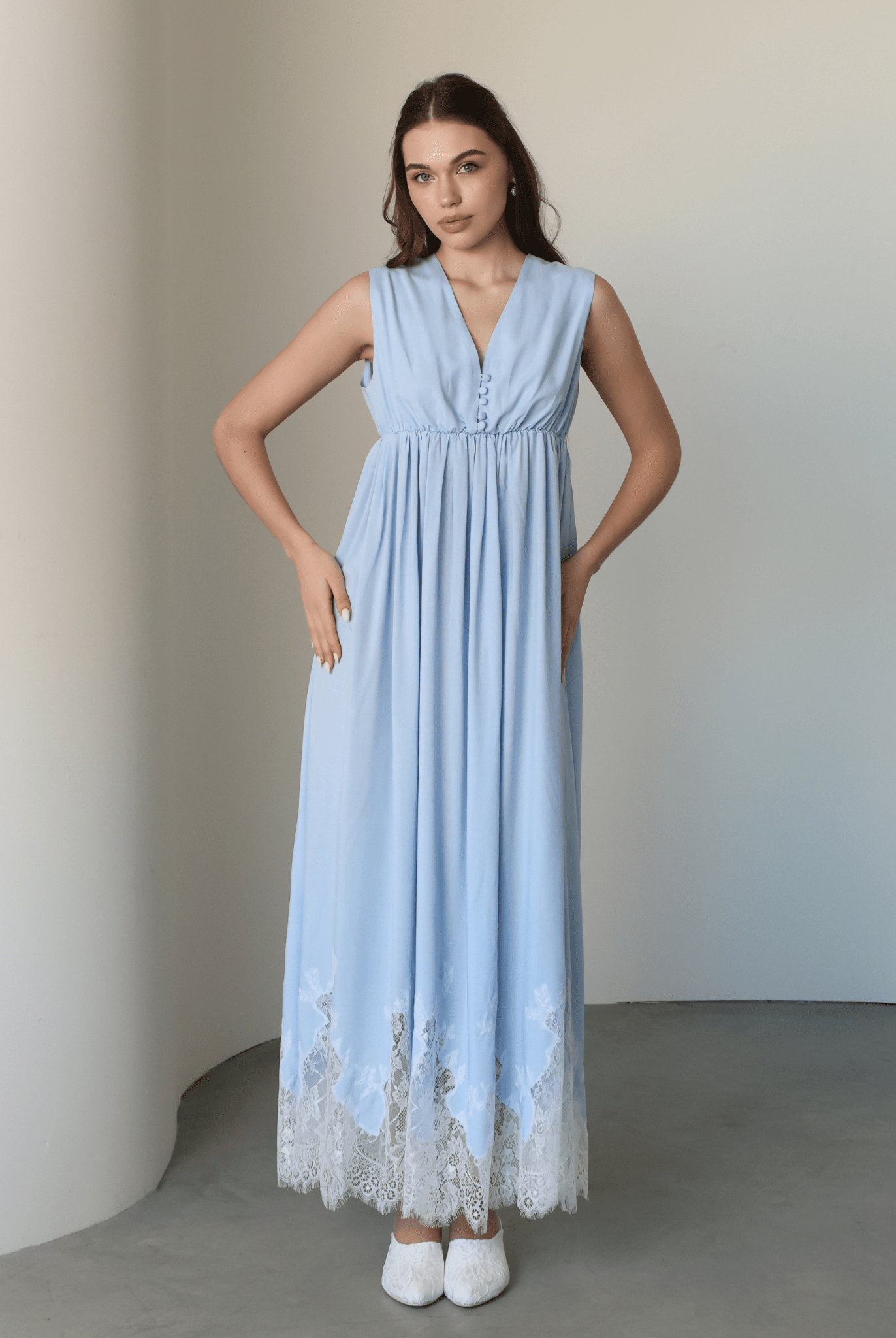 Frontal view of the sleeveless nightgown, featuring hidden front openings for easy and quick nursing access.