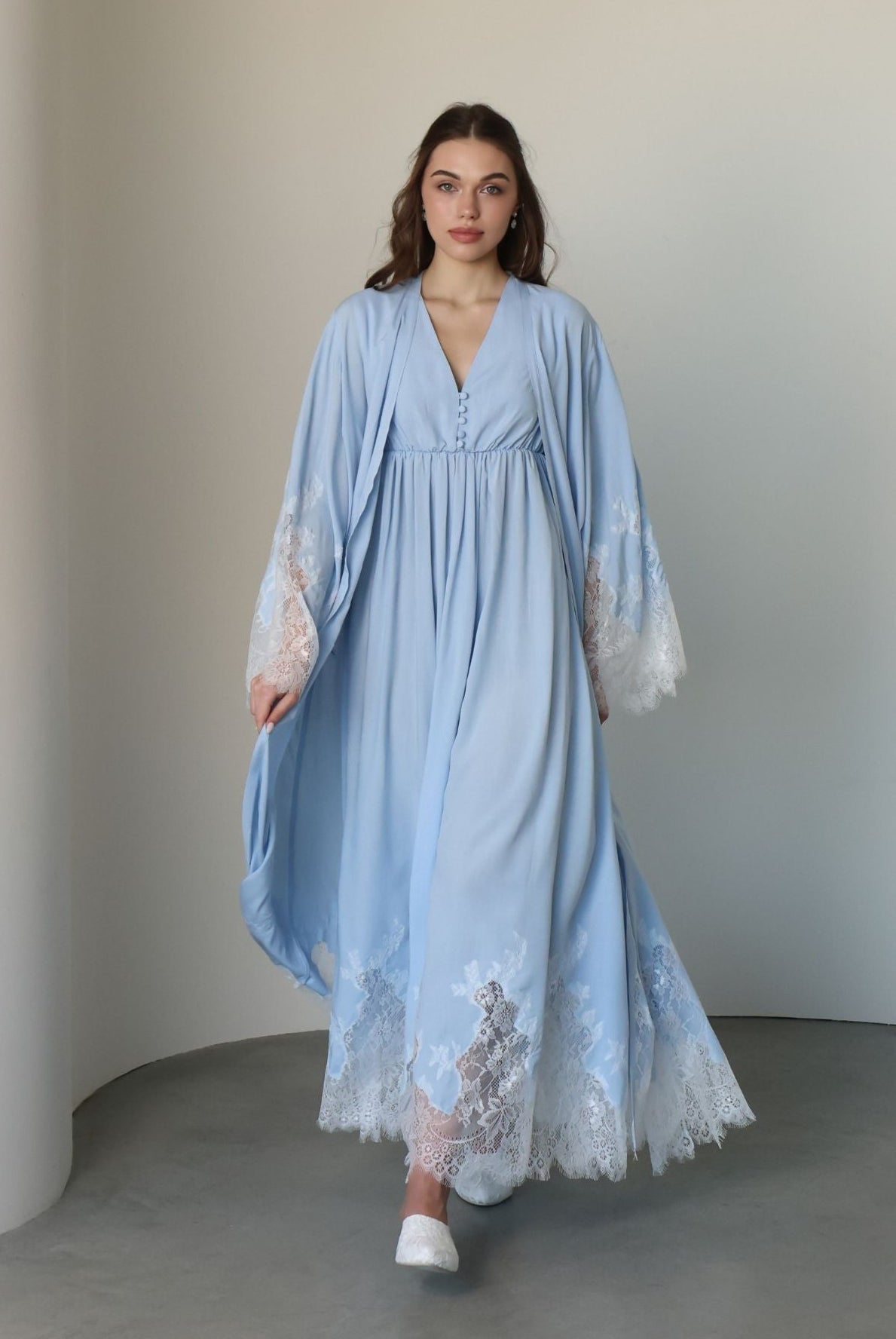A full-length motion shot of the Robe and Nightgown Set, capturing the light and breathable cotton blend.