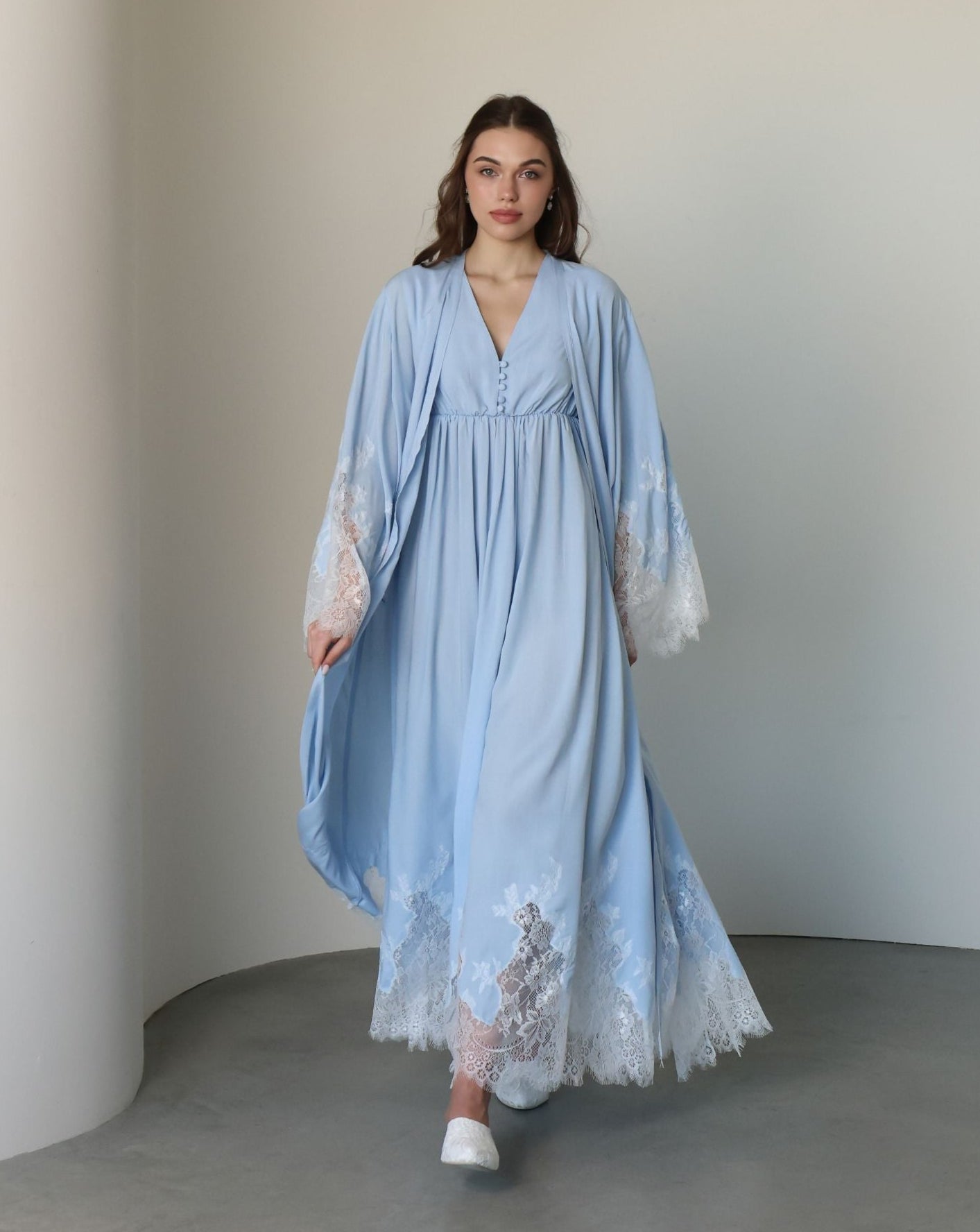 A full-length motion shot of the Robe and Nightgown Set, capturing the light and breathable cotton blend.