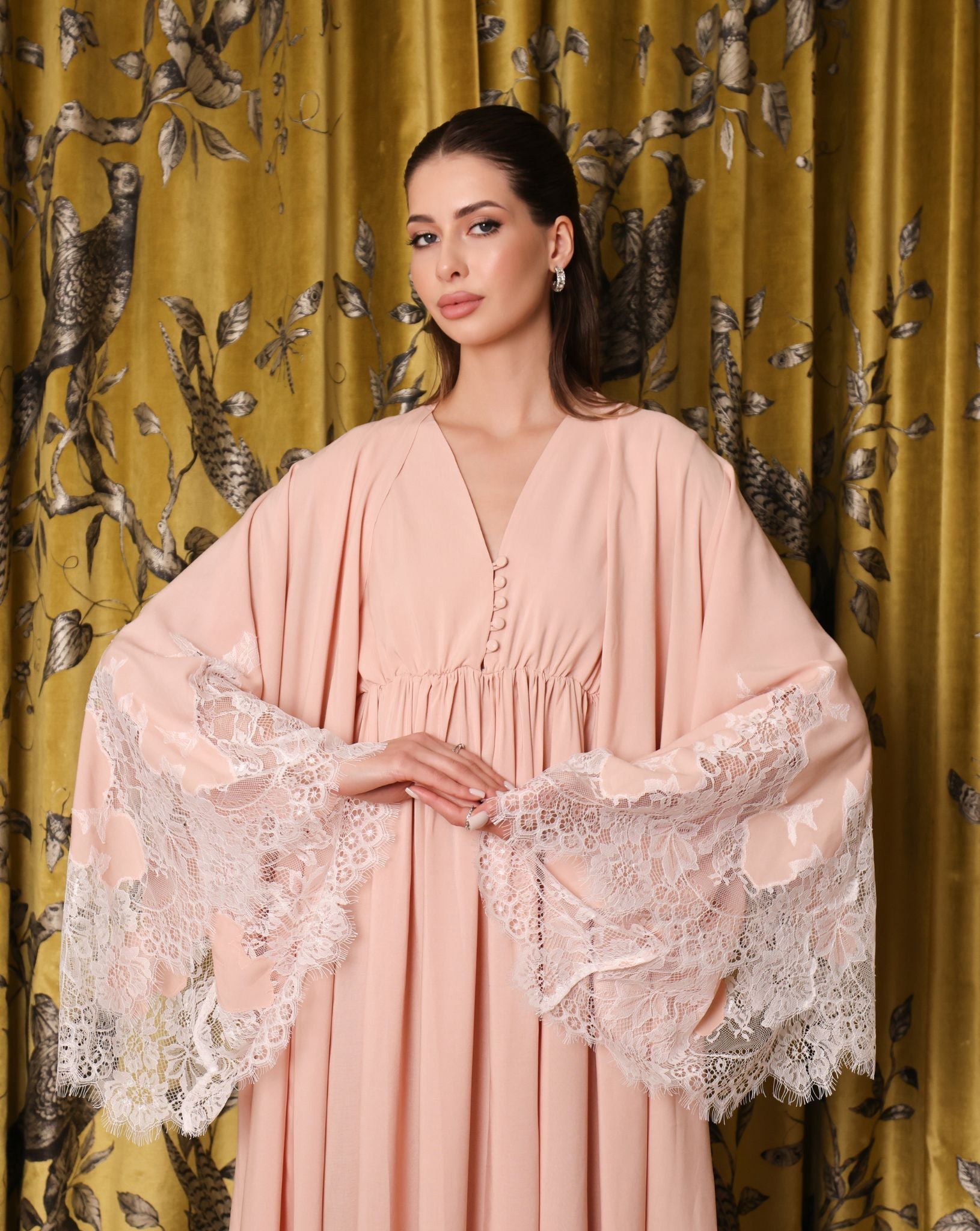 A close-up view highlighting the hidden front openings and buttons designed specifically for quick nursing access.