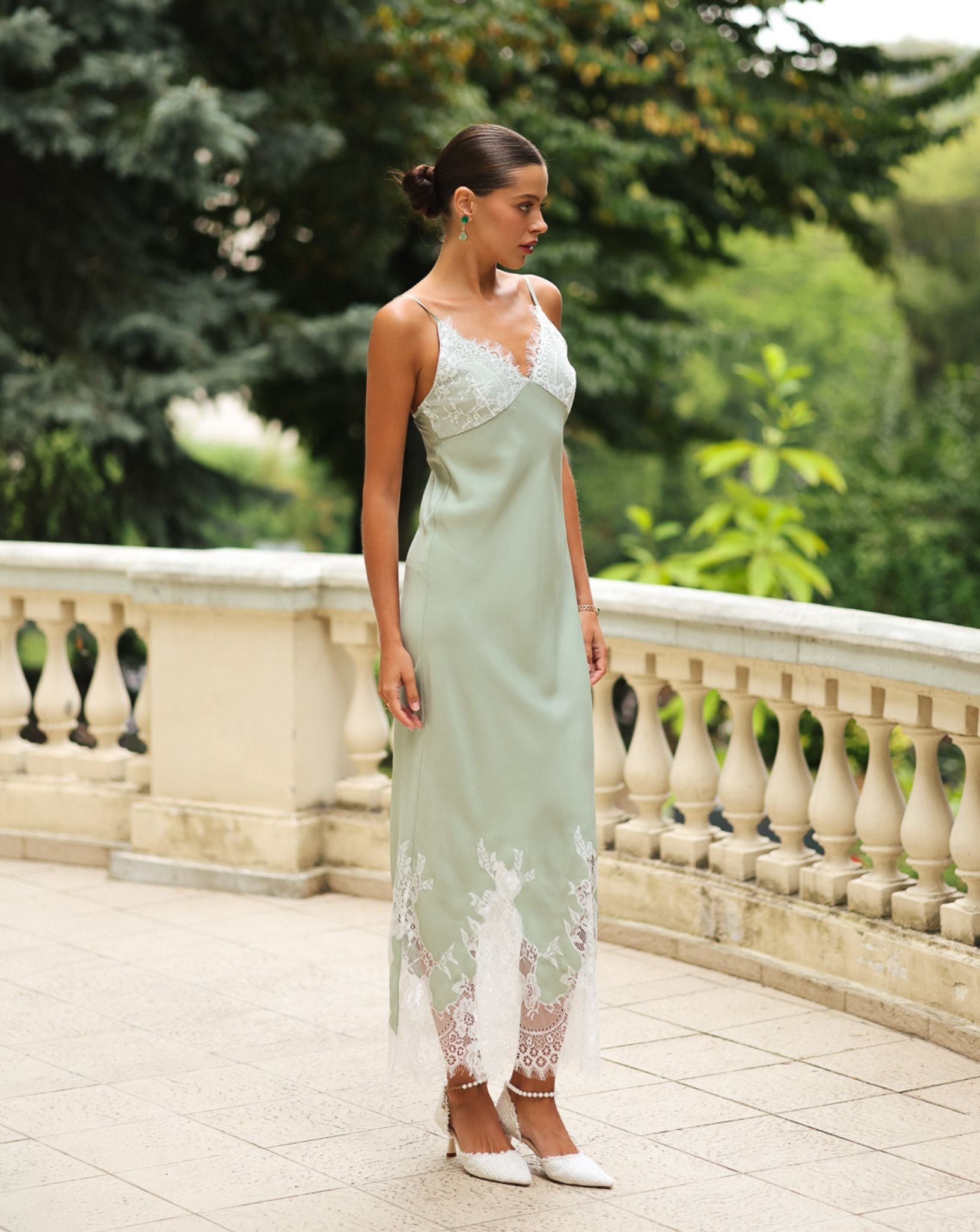 Side perspective of the long nightgown, emphasizing the flattering silhouette and the comfortable, non-restrictive fit.