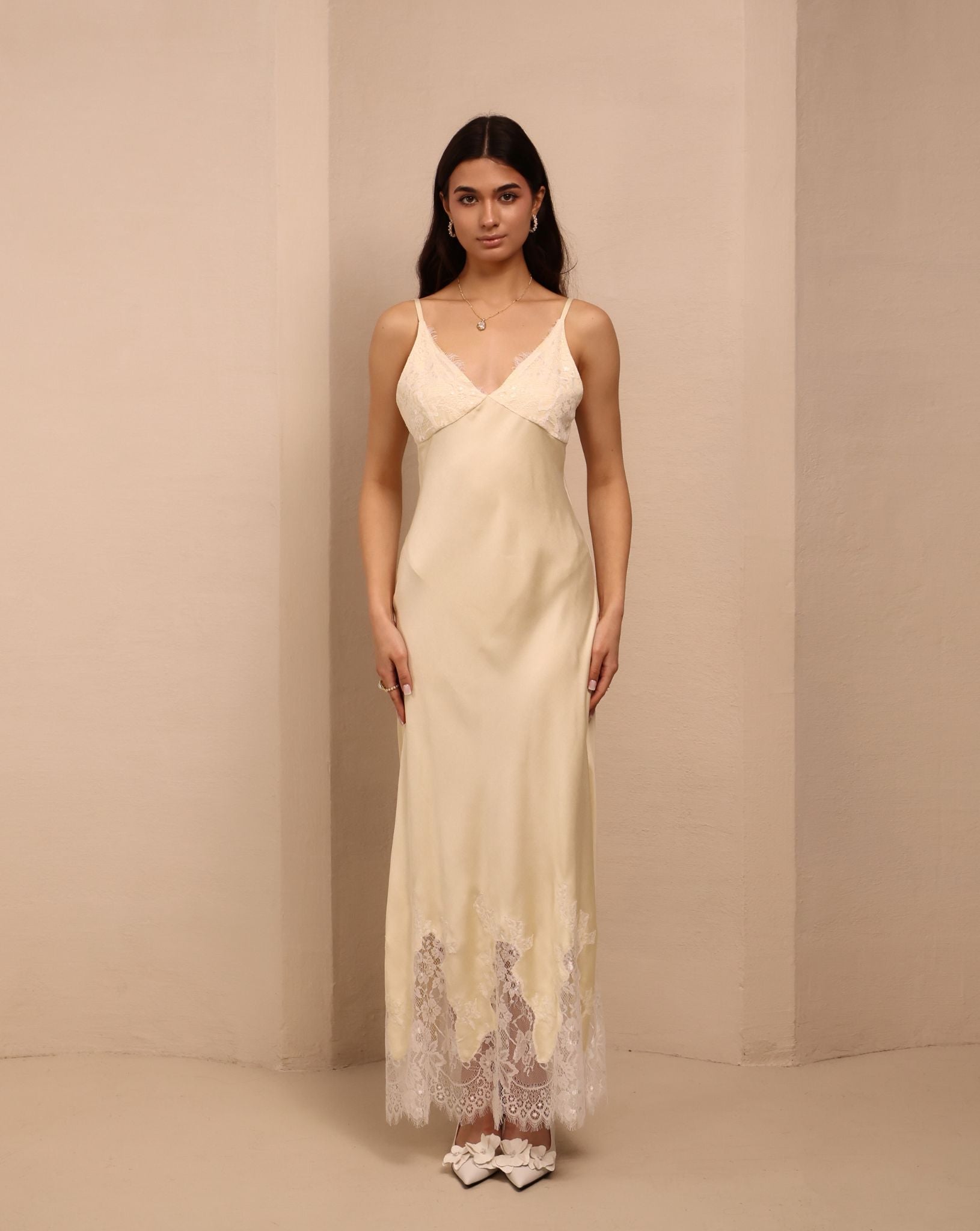 Frontal view of the nightdress, featuring delicate lace that trims the cups and the bottom edge for a fine touch.