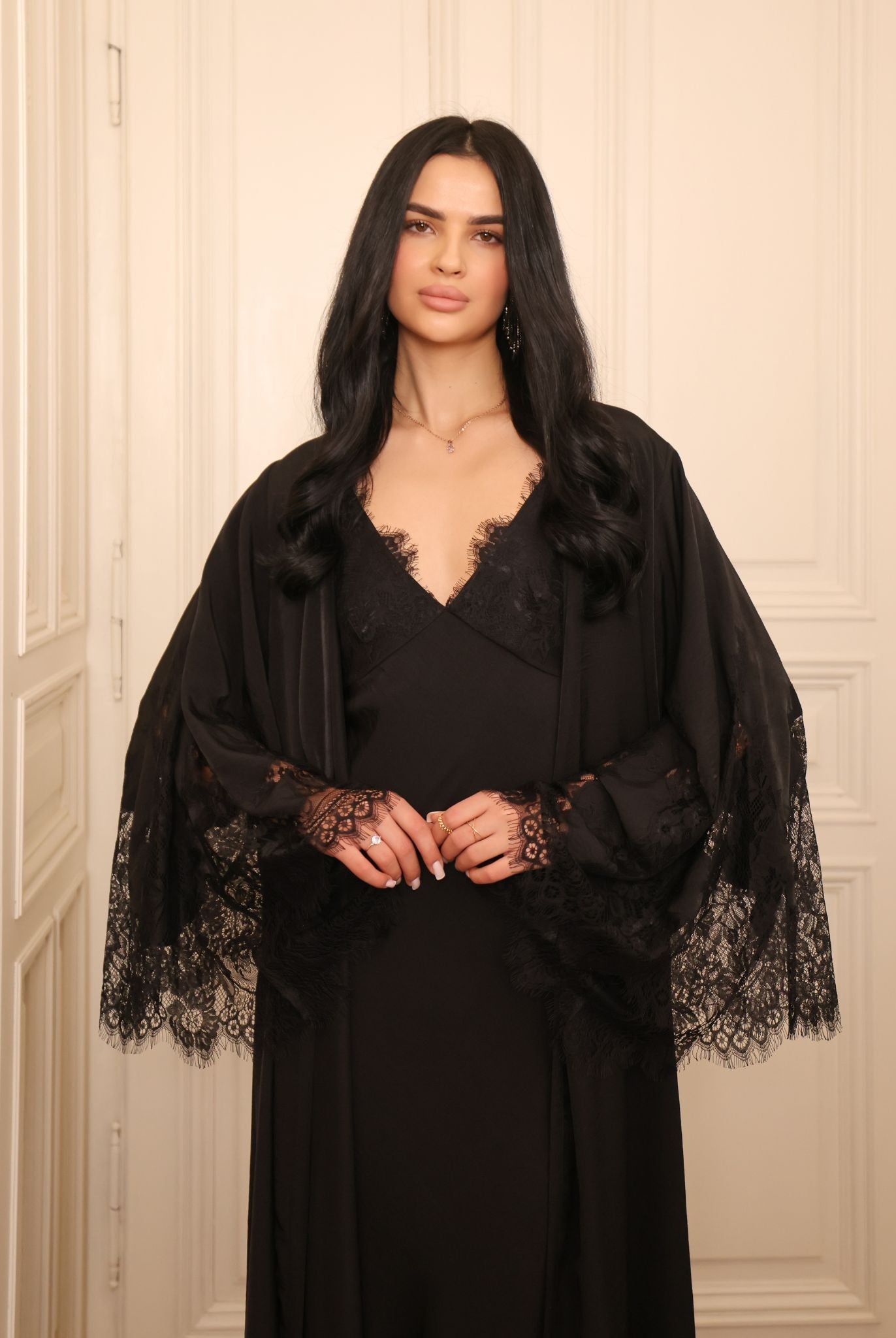 Mid-length view of the wrapped robe, highlighting the adjustable belt and the elegant lace-adorned sleeves.