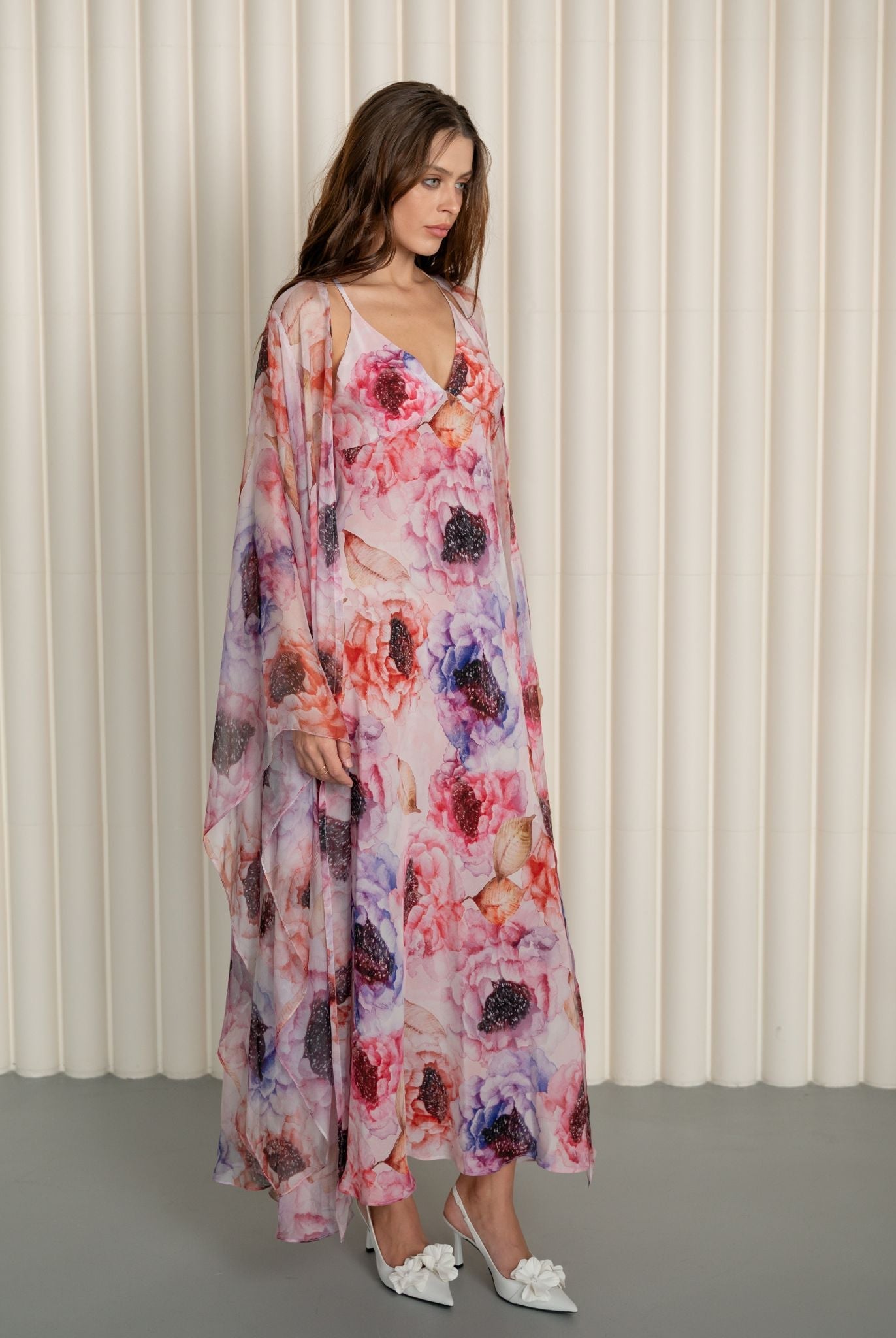 Elegant silk ensemble with dropped shoulders, highlighting the romantic peony print and soft semi-sheer texture.