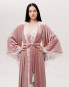 A mid-length view with hands on the waist, showcasing the luxurious essential for quiet, sensual moments.