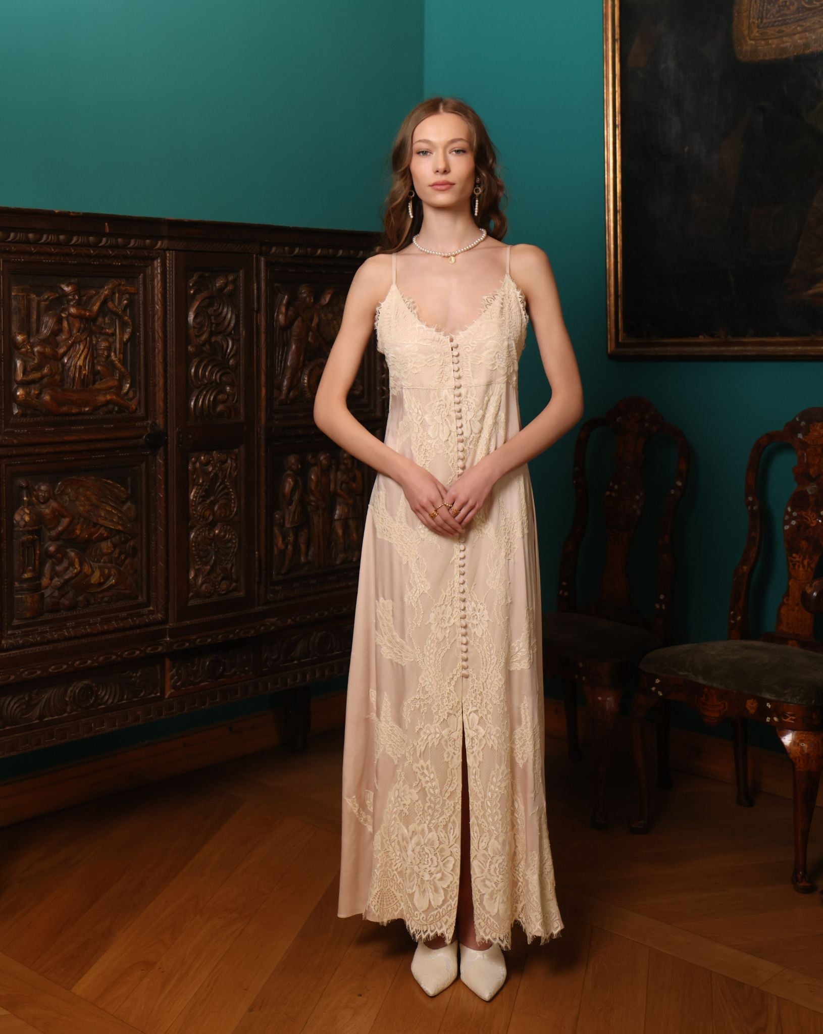 Frontal view of the nightgown featuring adjustable straps and a design that allows for gentle nursing access.