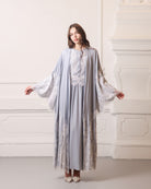Modest ensemble featuring a wide-sleeved robe layered over a long-sleeved nightdress with lace accents.
