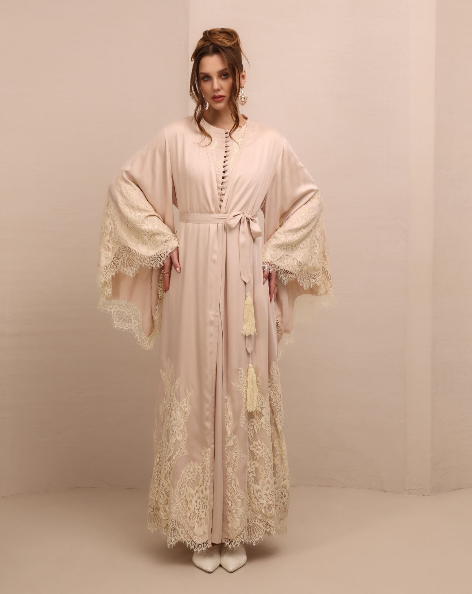 A poised frontal shot of the tied attire, illustrating a modest look and the gentle feel of light viscose.