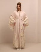 A poised frontal shot of the tied attire, illustrating a modest look and the gentle feel of light viscose.