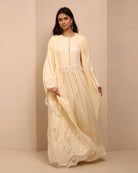 A dynamic view of the Robe and Nightgown Set in motion, highlighting the floor-length cut and wide sleeves.