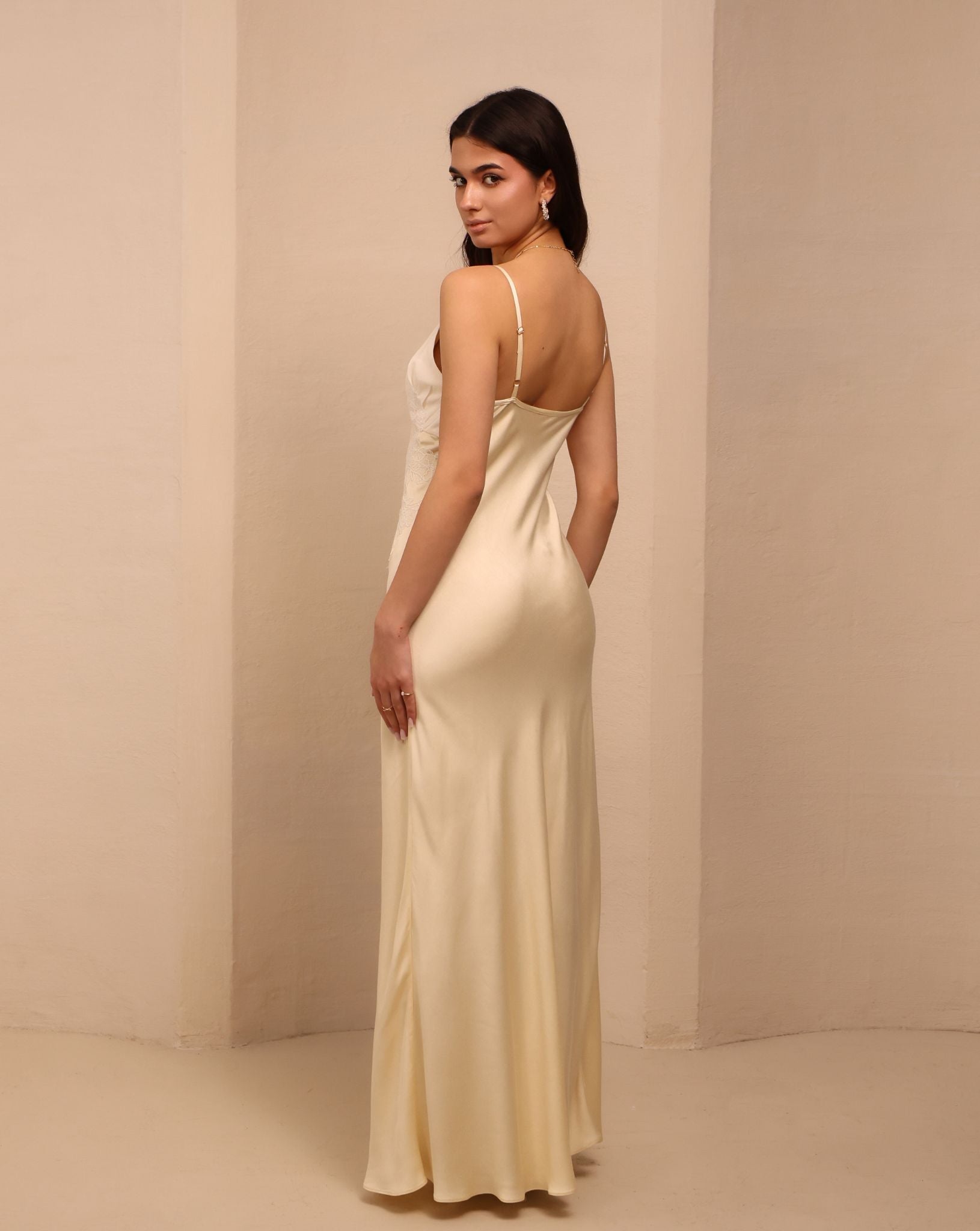 Rear view of the bias-cut nightgown, highlighting the timelessly feminine style and high-quality materials.