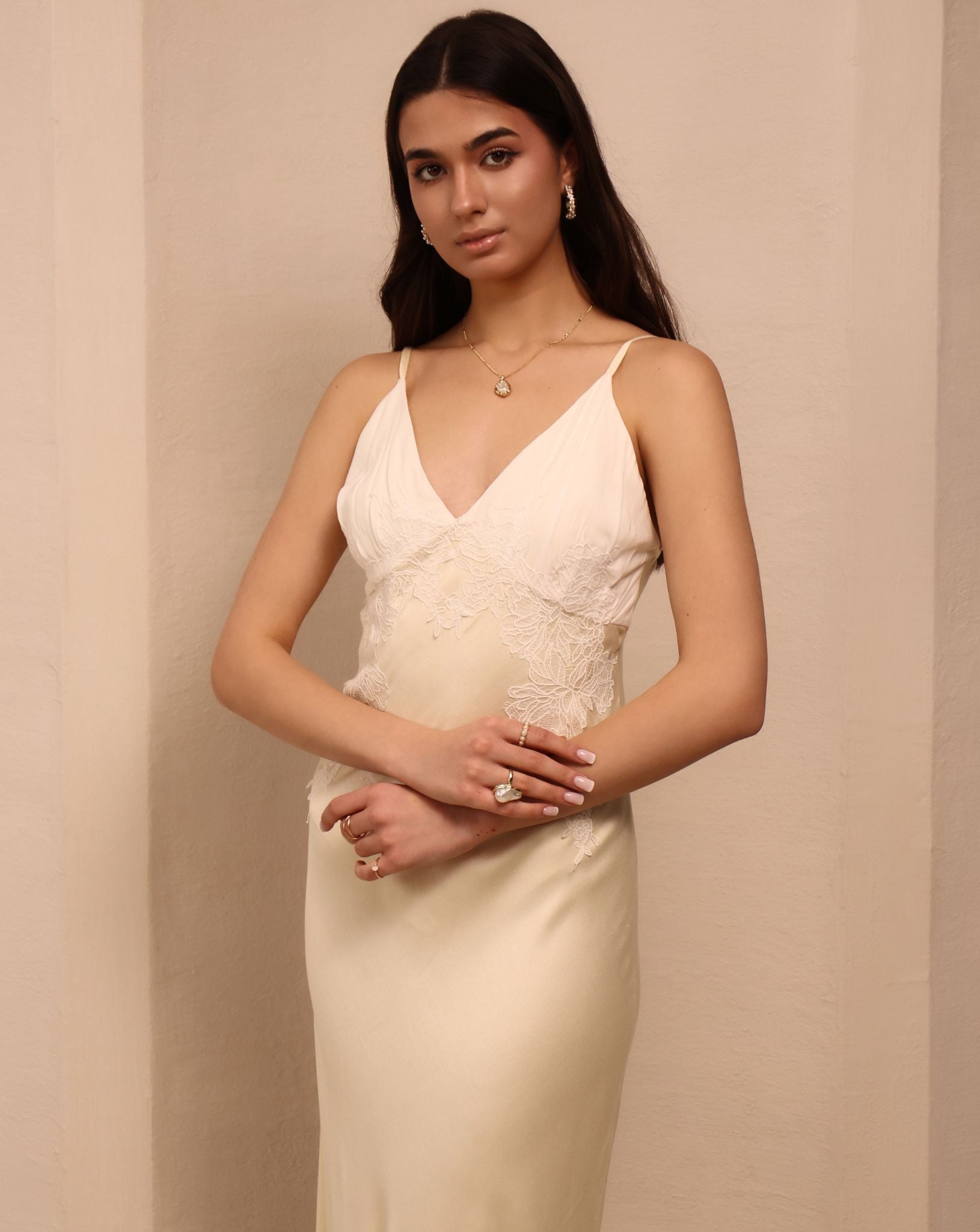 A mid-length shot of the nightgown, highlighting the expert tailoring and the fabric's effortless glide on the body.