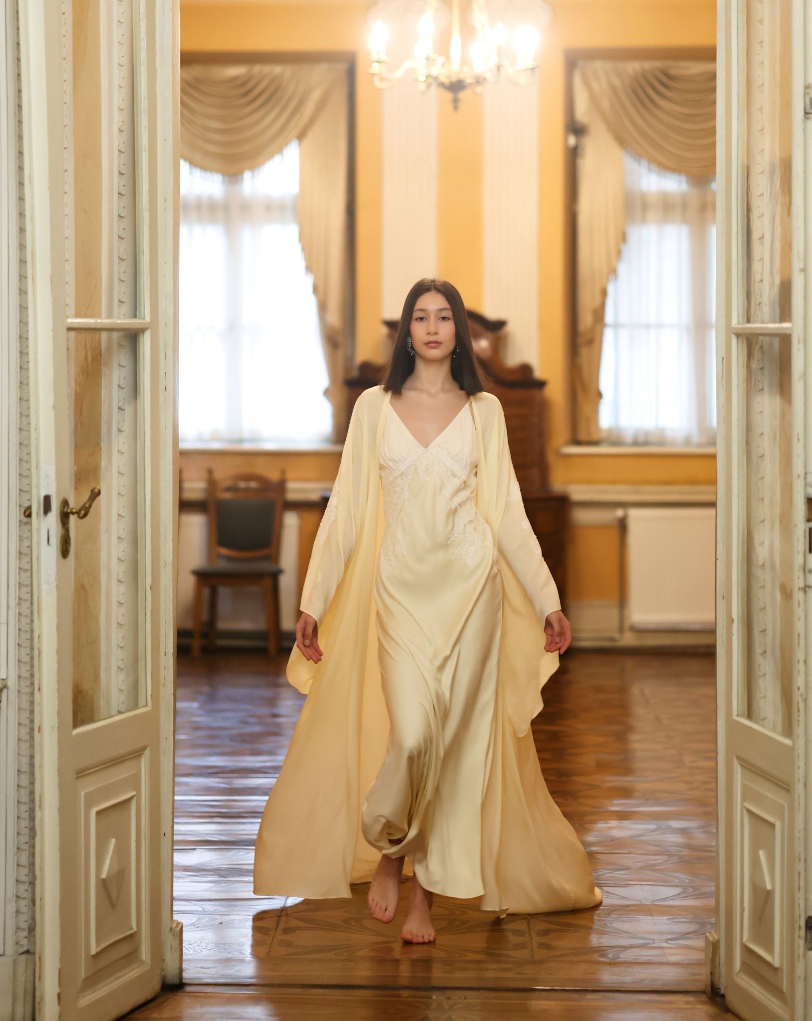 A creative shot of the Robe and Nightgown Set in a museum setting, capturing a timeless and refined aesthetic.